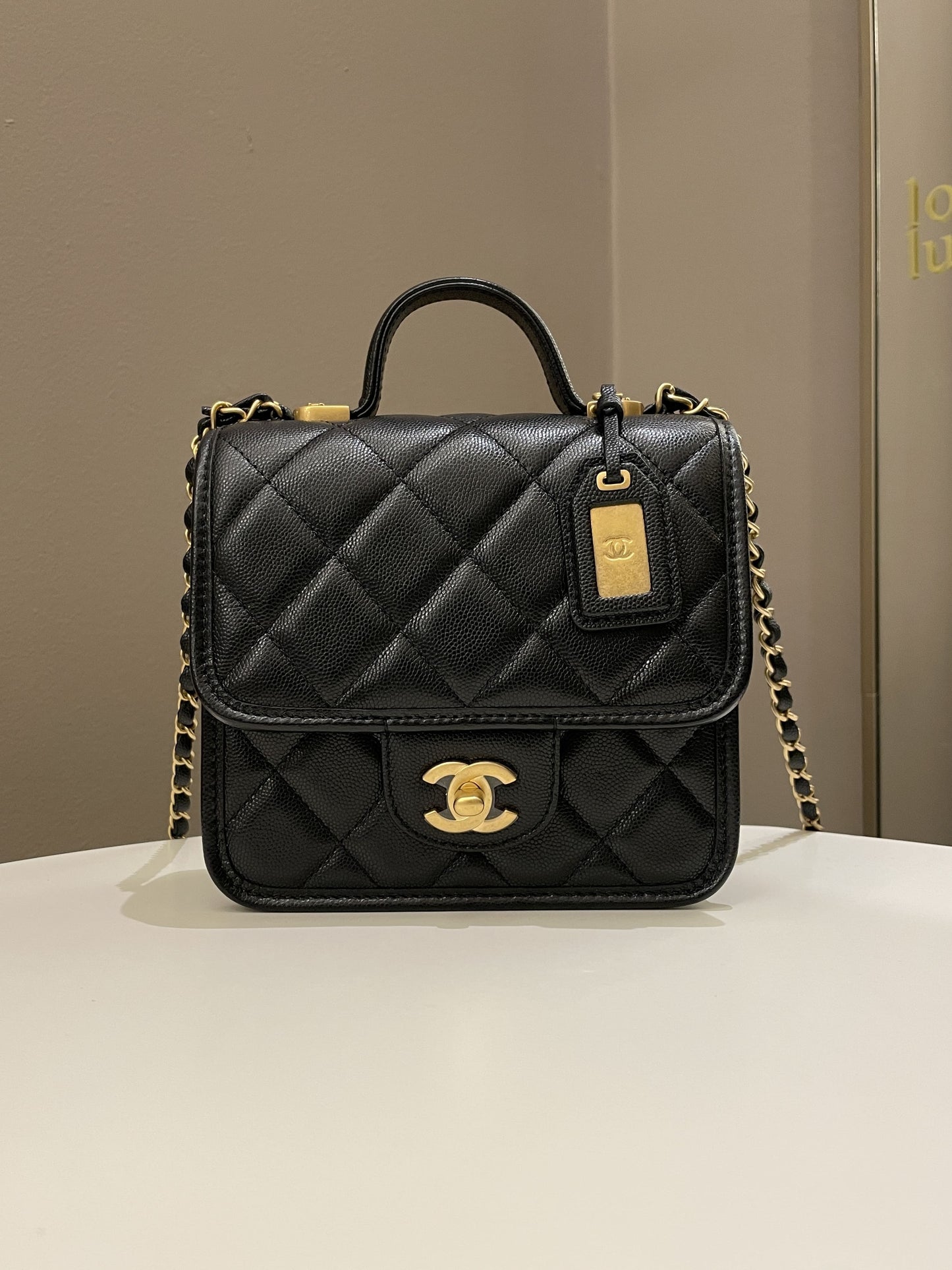 Chanel 22K Flap with Top Handle Black Caviar
