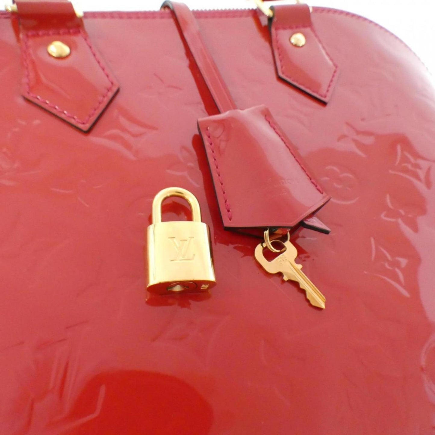 Alma BB Monogram Vernis Handbag