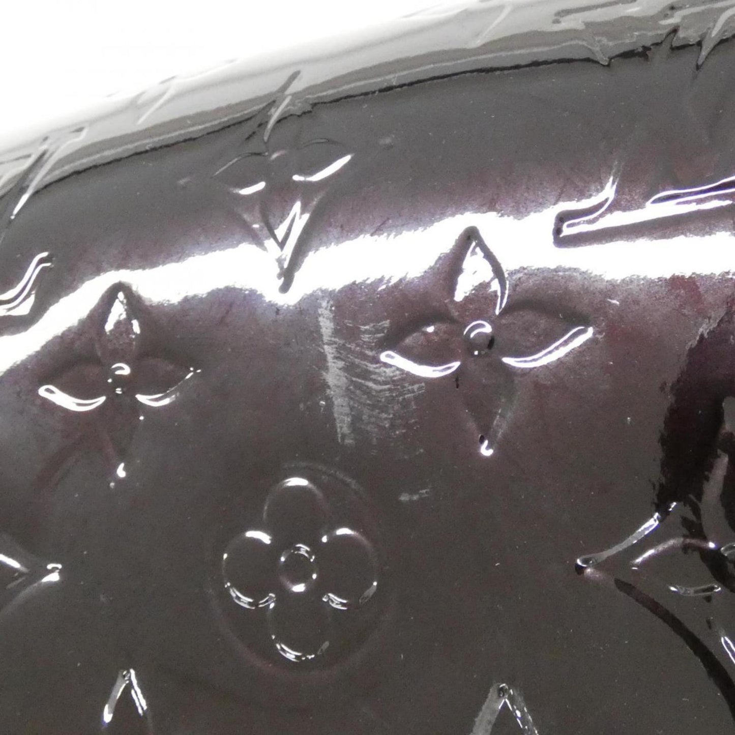 Monogram Vernis Alma MM Patent Leather Handbag