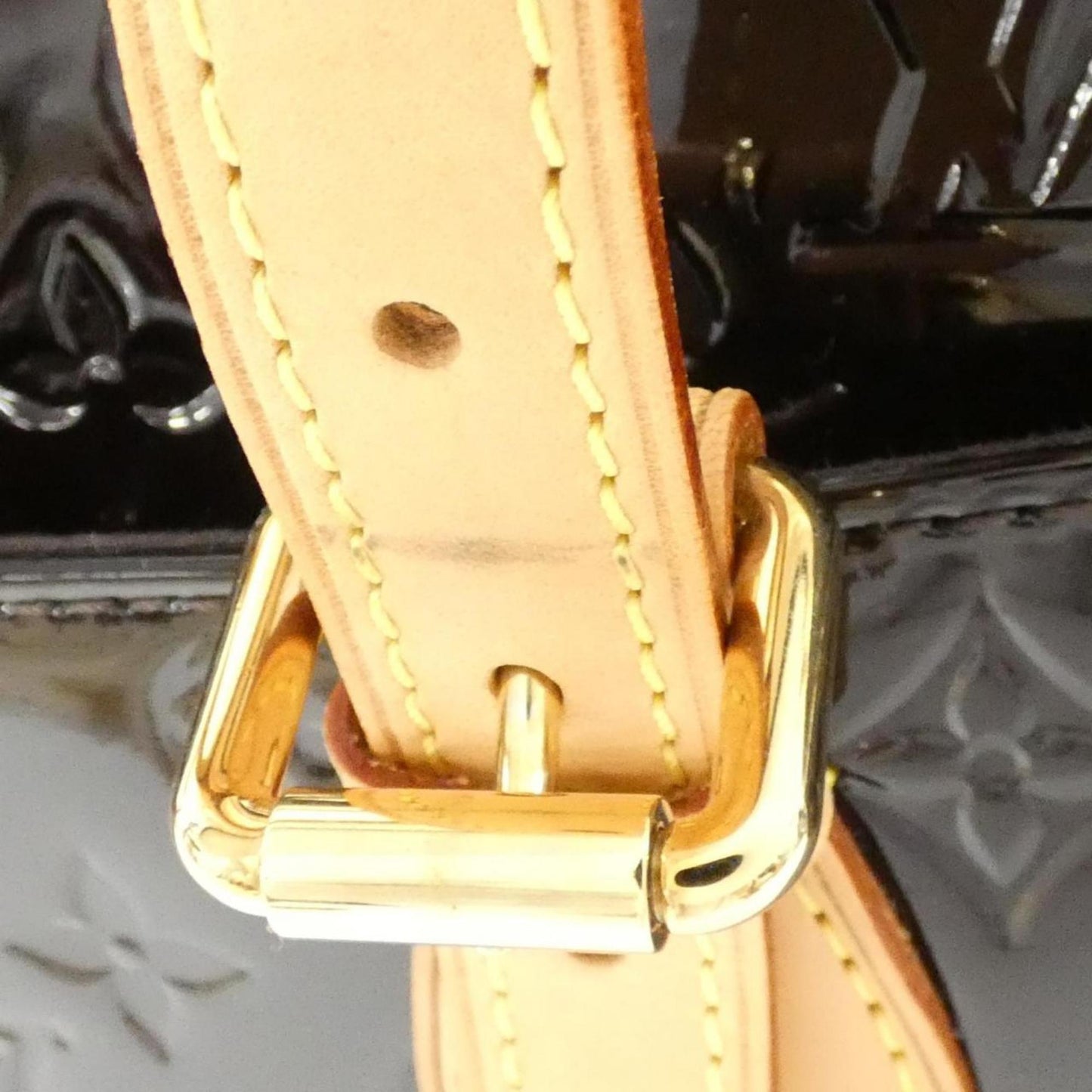 Monogram Vernis Alma MM Patent Leather Handbag