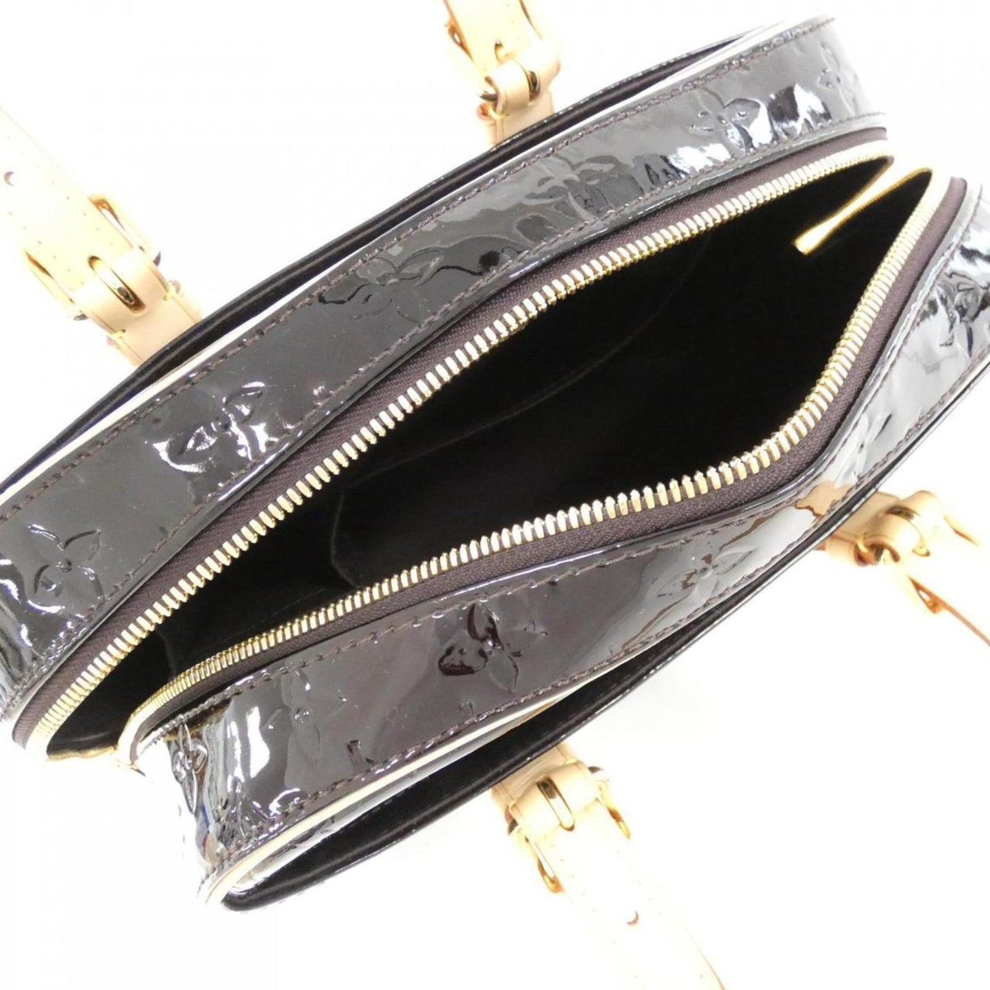 Monogram Vernis Alma MM Patent Leather Handbag