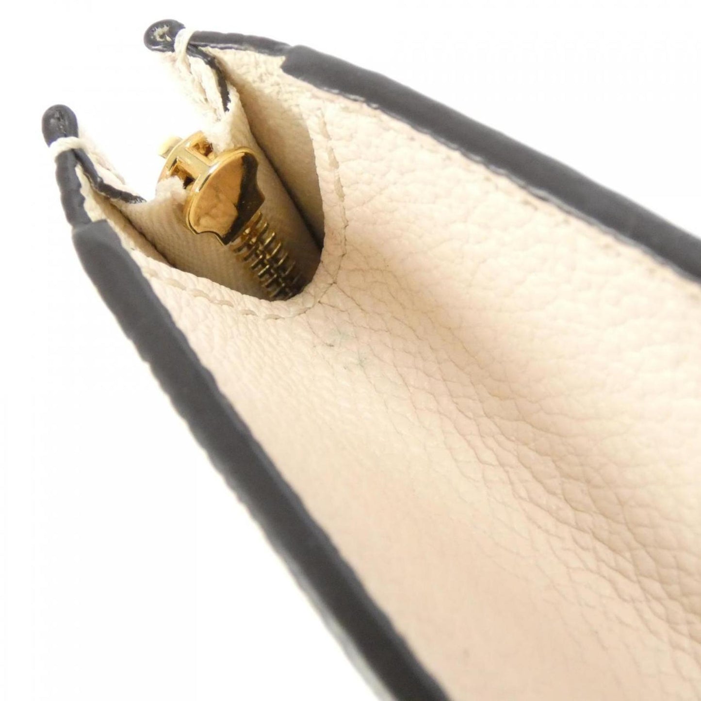 Pochette Monogram Empreinte Clutch