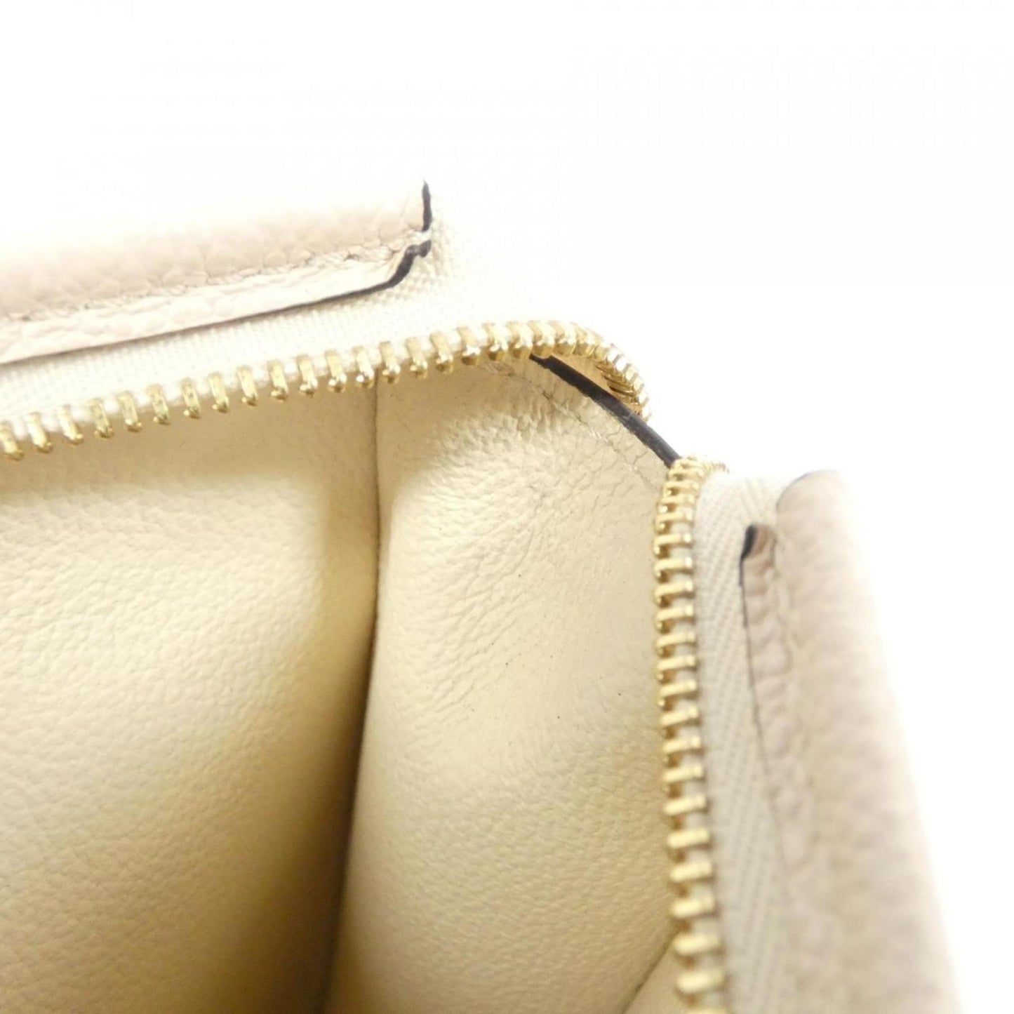 Pochette Monogram Empreinte Clutch