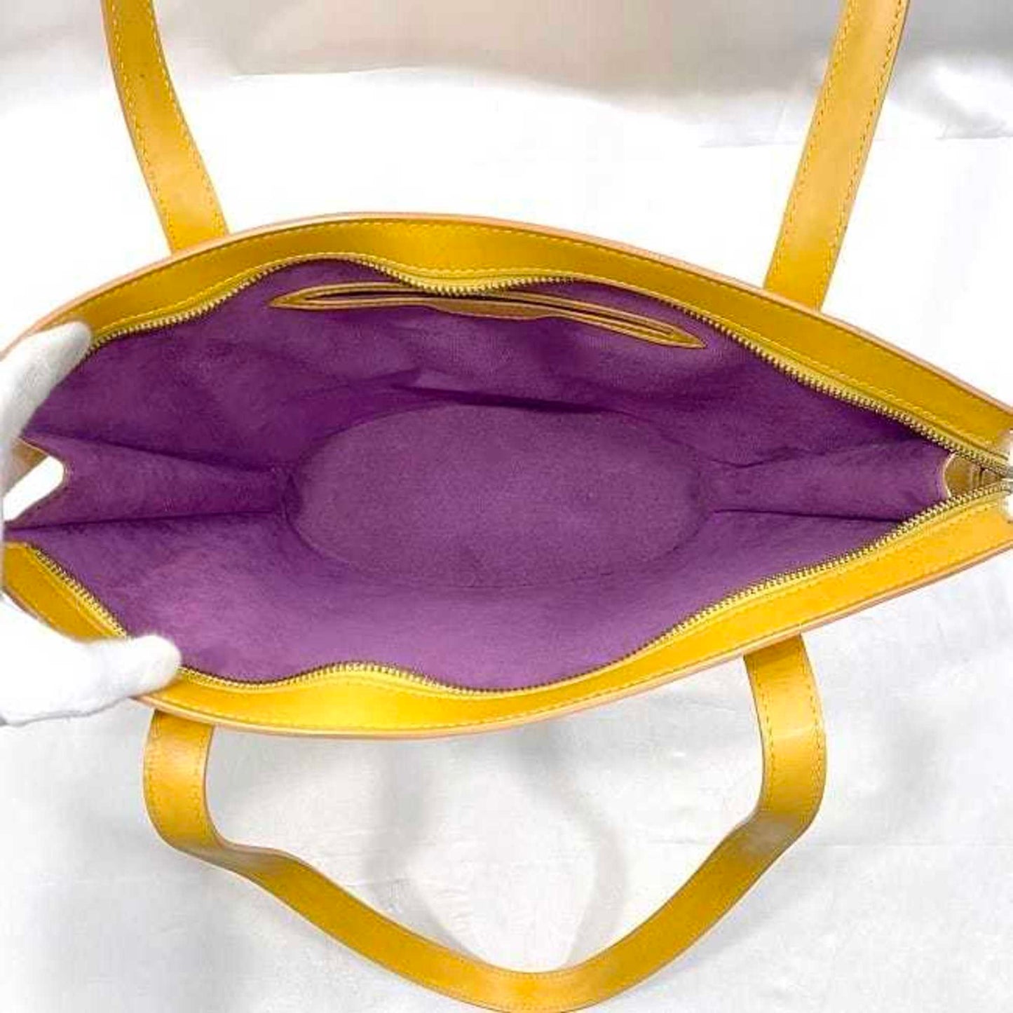 Leather Handbag with Slight Wear and Staining