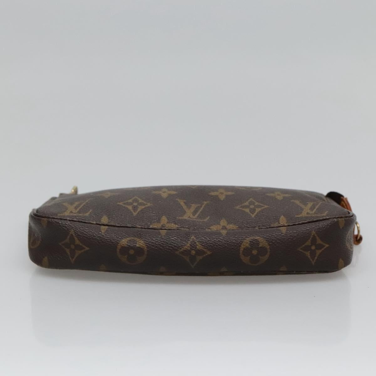 Pochette Flicie Monogram Canvas Clutch