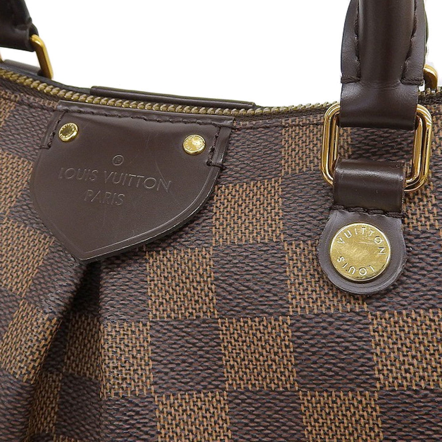 Elegant Canvas Shoulder Bag with Strap and Metal Accents