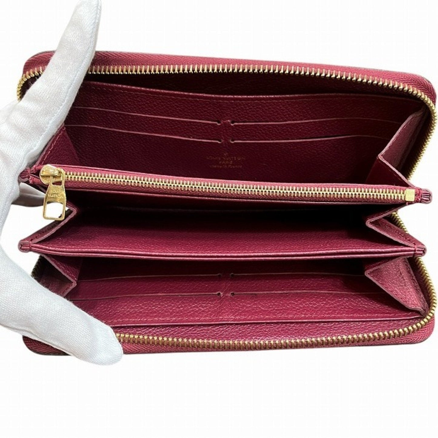 Leather Zippy Wallet with Multiple Compartments and Secure Closure