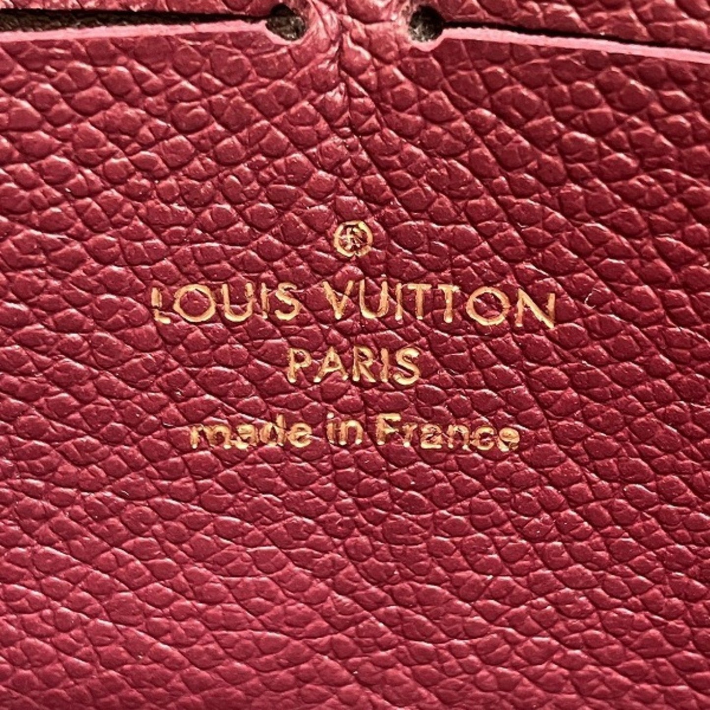 Leather Zippy Wallet with Multiple Compartments and Secure Closure