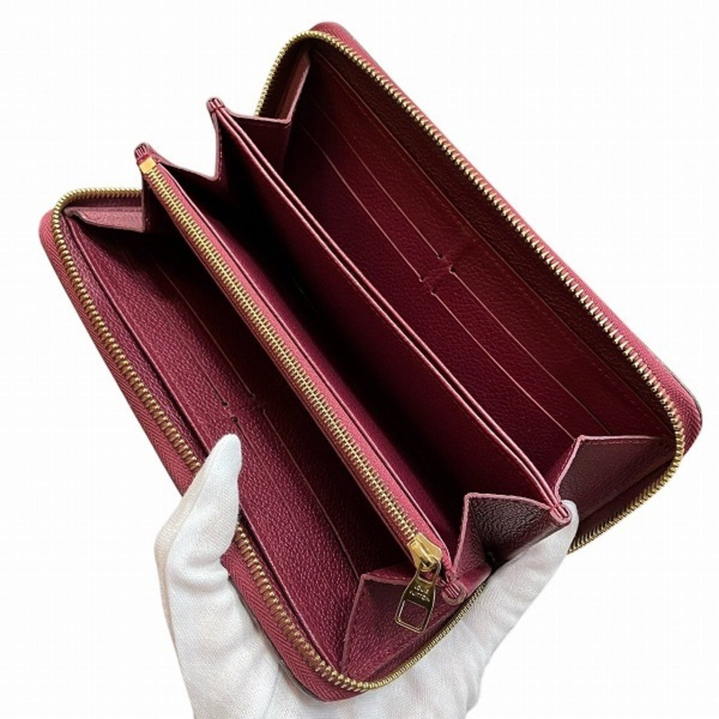 Leather Zippy Wallet with Multiple Compartments and Secure Closure