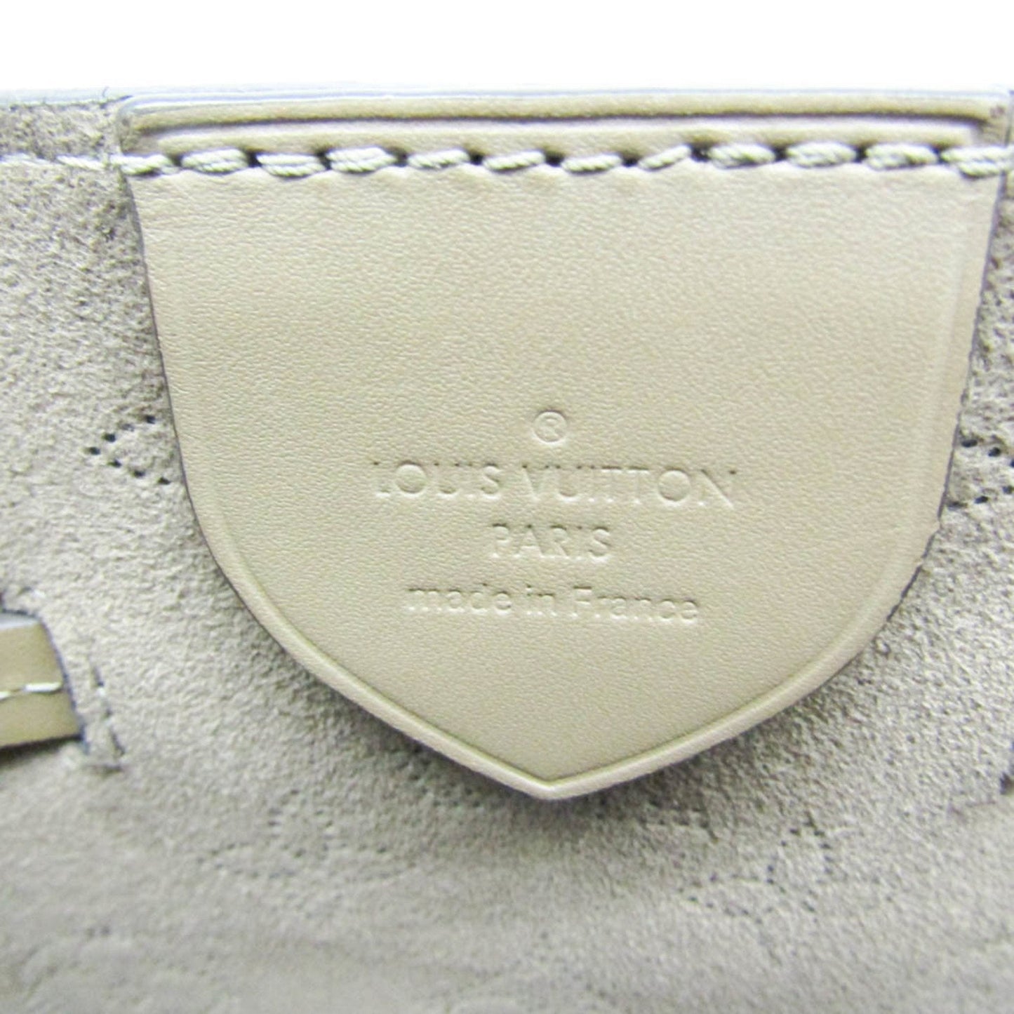 Elegant Leather Mahina Handbag with Timeless Detailing