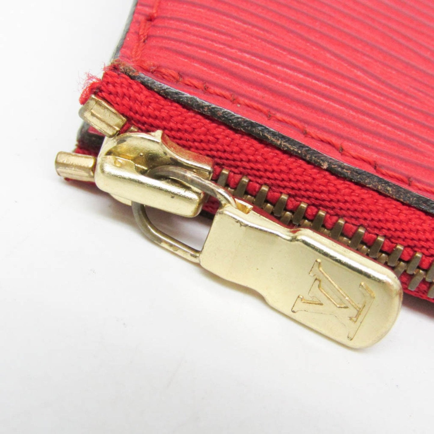 Luxurious Leather Pochette Accessoire with Slightly Worn Condition
