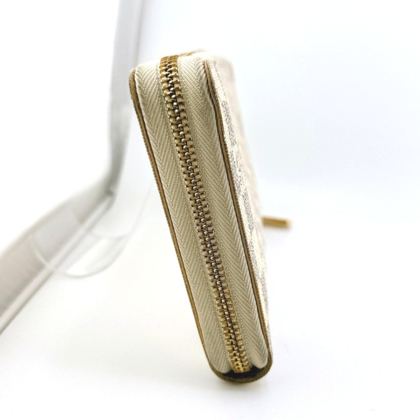 Luxury Canvas Zippy Wallet with Slightly Rubbed Corners