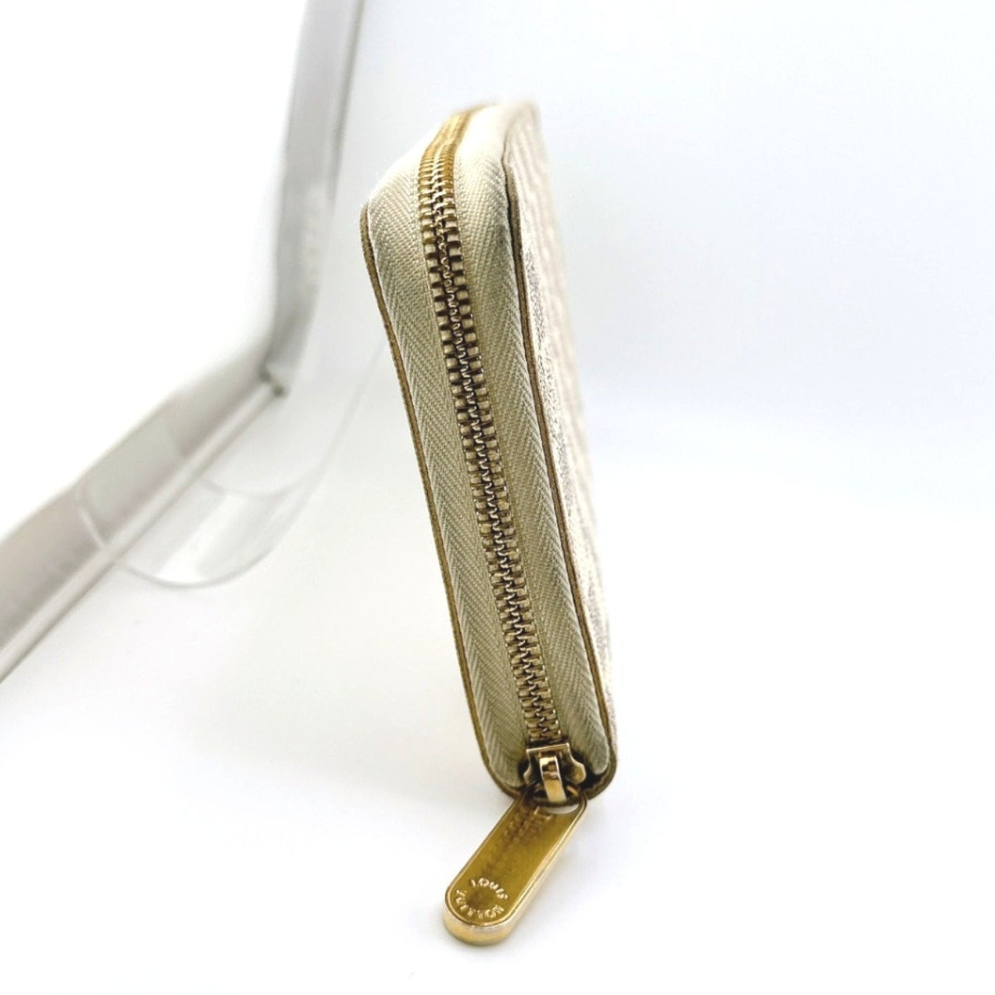 Luxury Canvas Zippy Wallet with Slightly Rubbed Corners