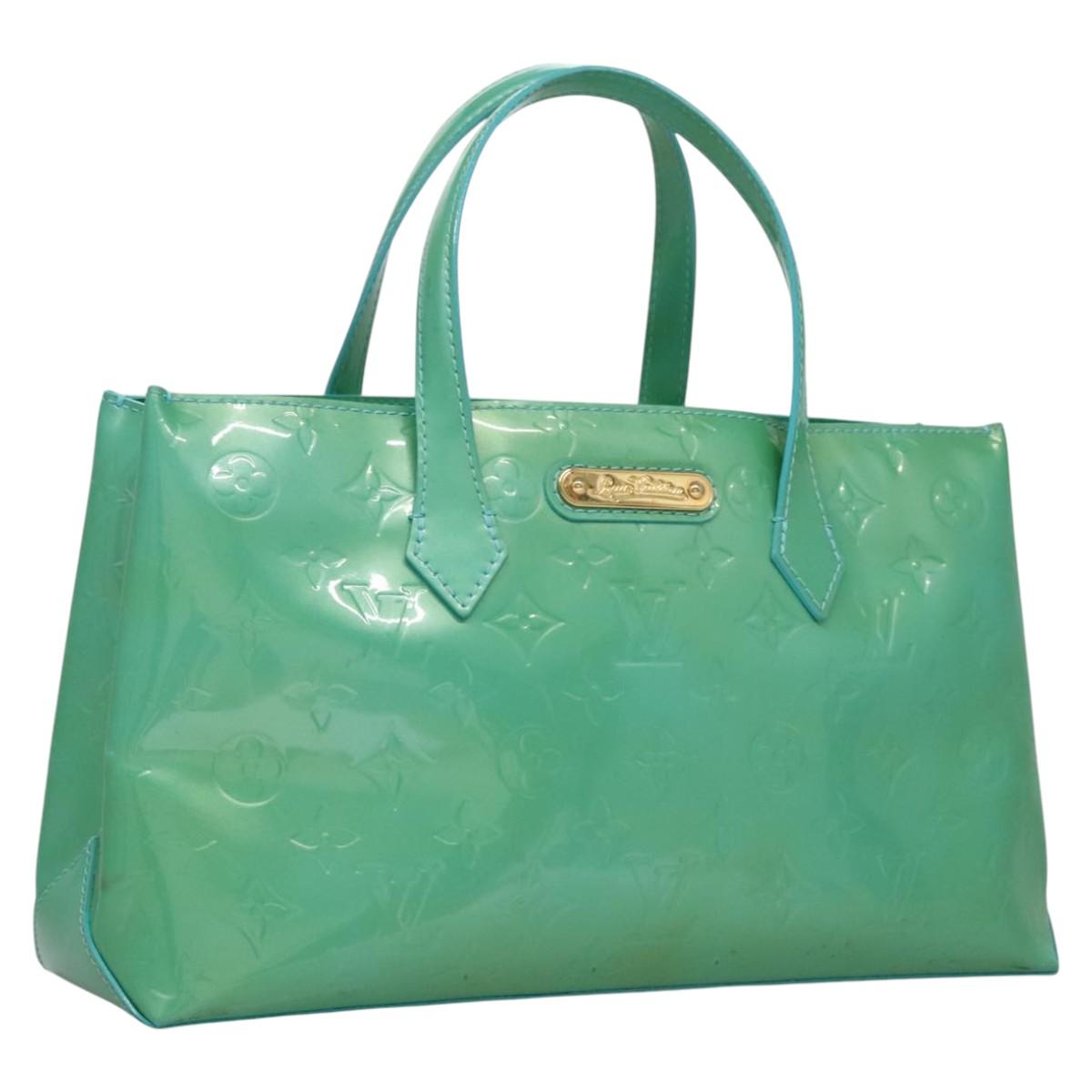 Elegant Patent Leather Tote Bag with Minimal Wear