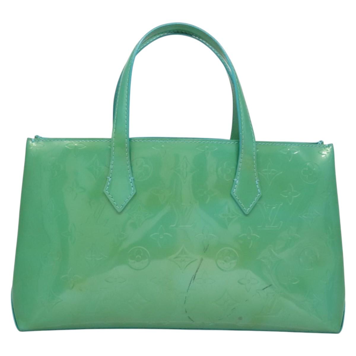 Elegant Patent Leather Tote Bag with Minimal Wear