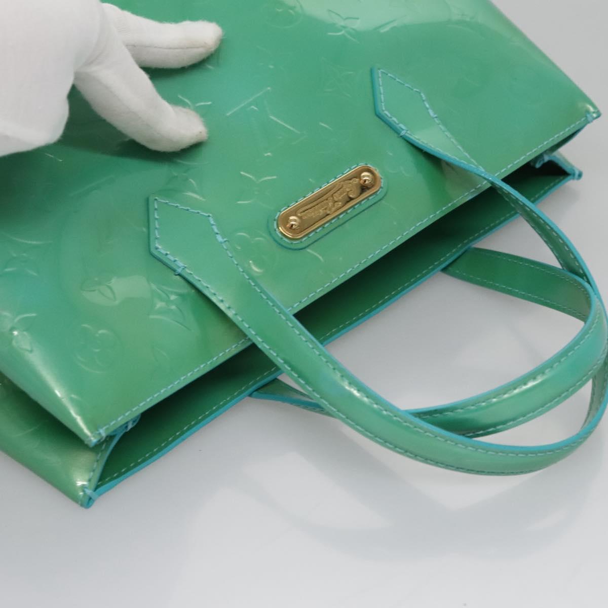 Elegant Patent Leather Tote Bag with Minimal Wear