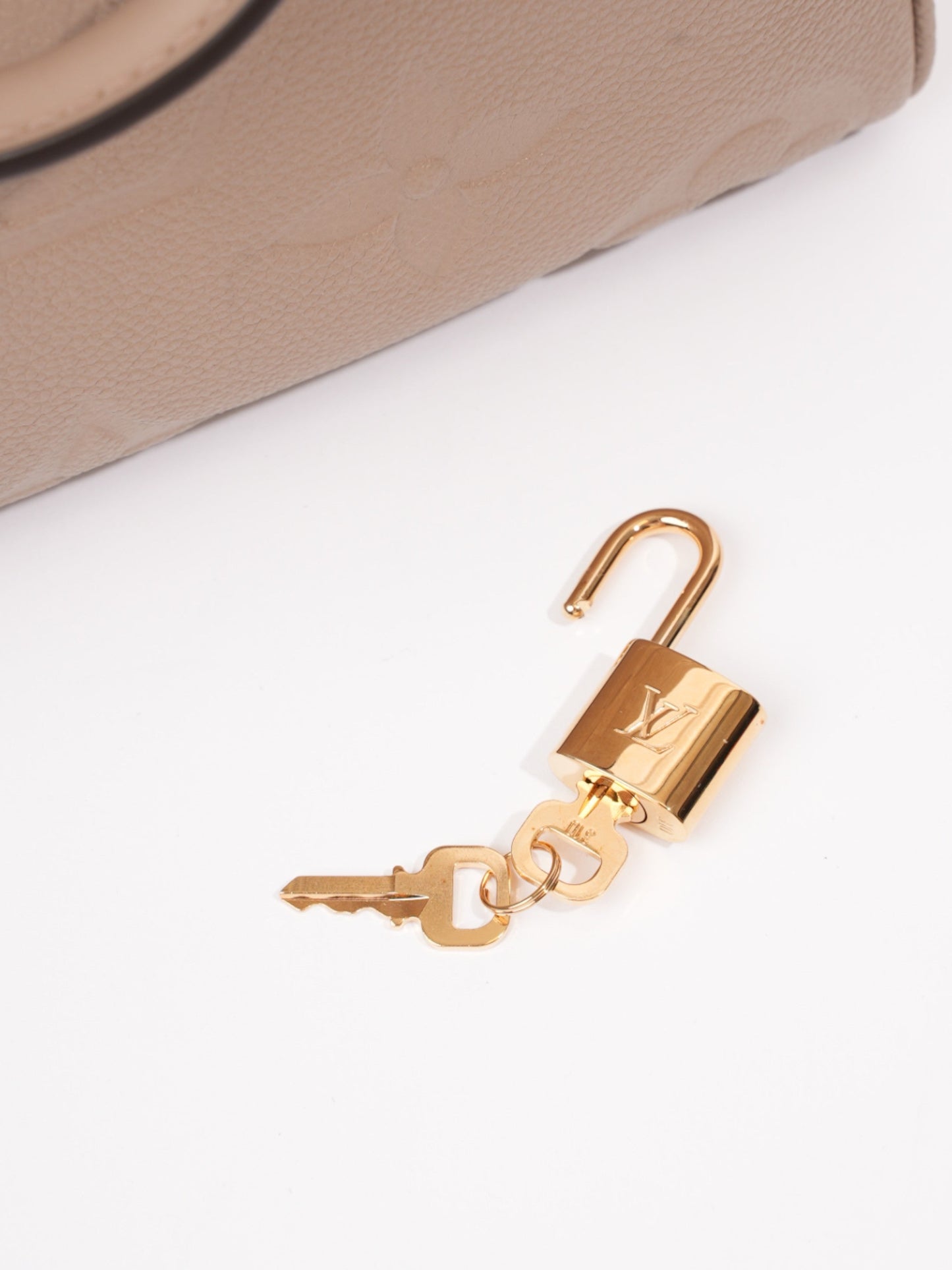 Louis Vuitton Speedy Bandouli猫re 25 Dune Empreinte Leather