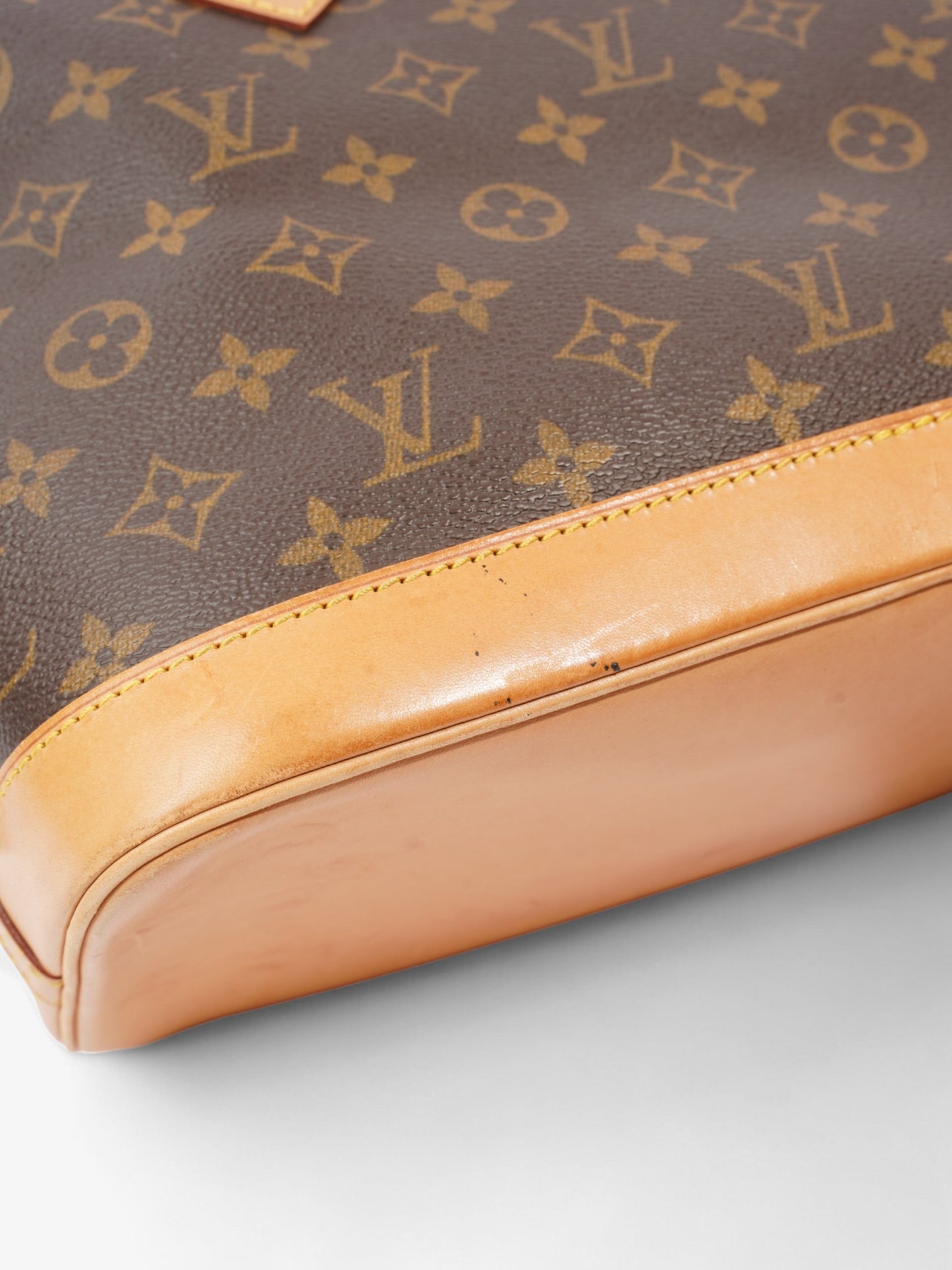 Louis Vuitton Alma Monogram Coated Canvas PM