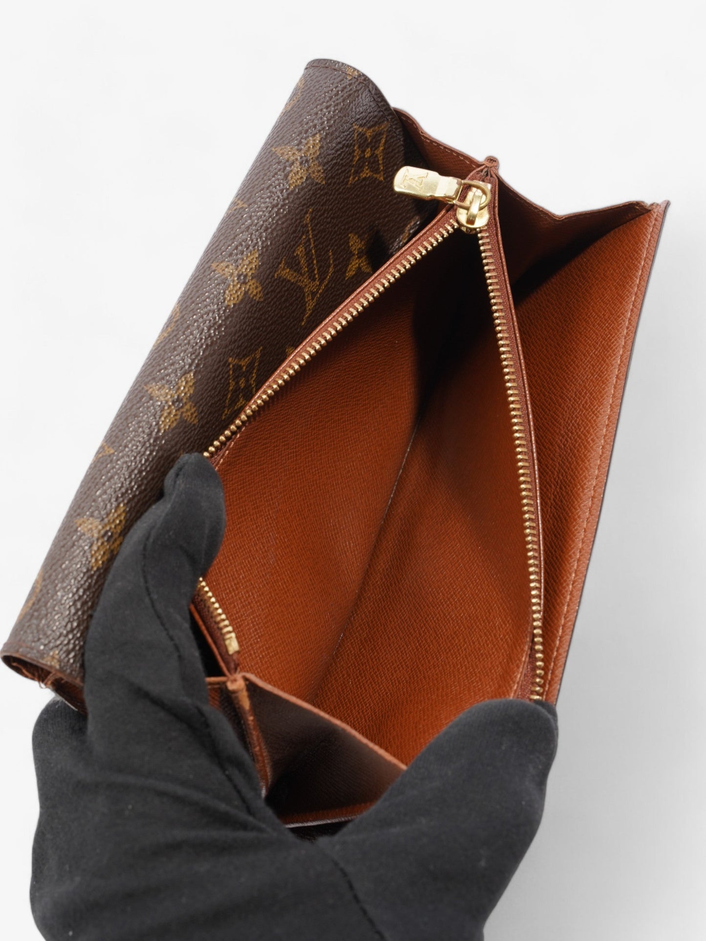 Louis Vuitton Portefeuille International Wallet Monogram Coated Canvas
