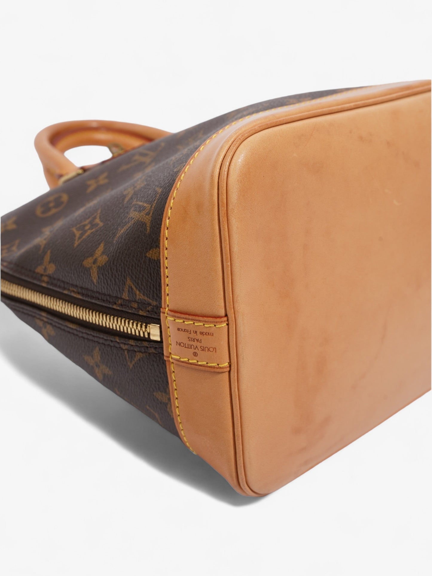 Louis Vuitton Alma Monogram Coated Canvas PM