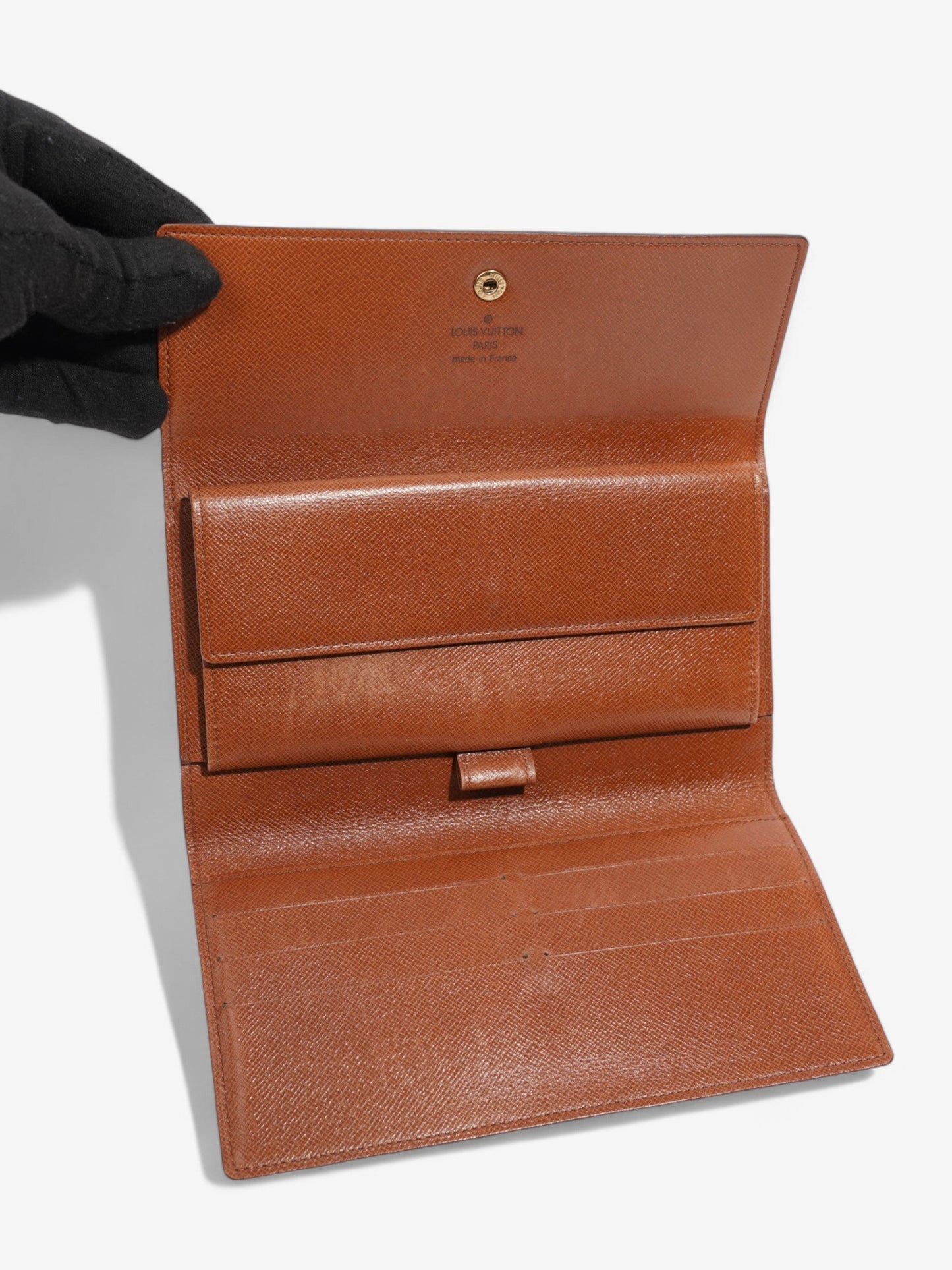 Louis Vuitton Portefeuille International Wallet Monogram Coated Canvas