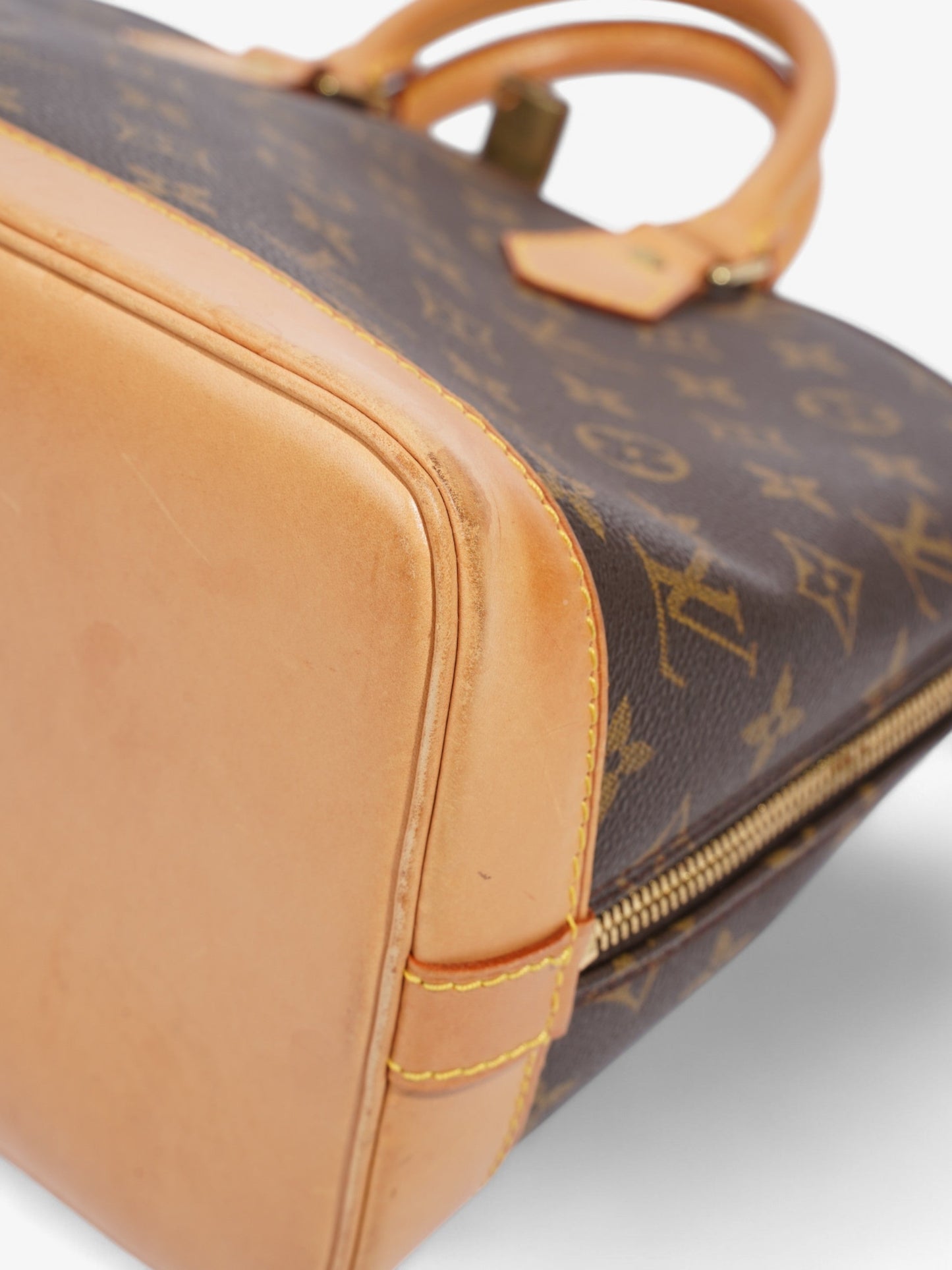 Louis Vuitton Alma Monogram Coated Canvas PM