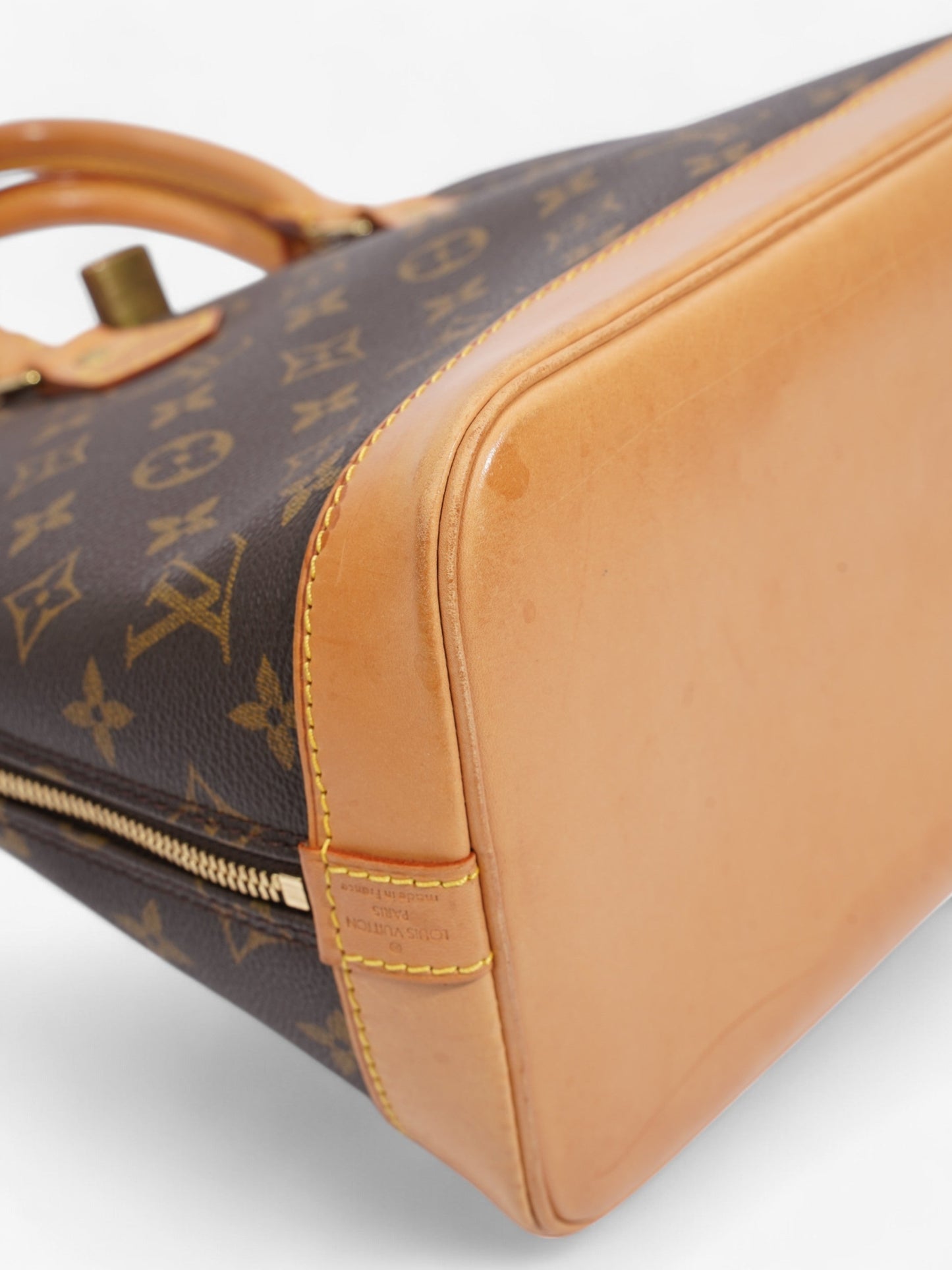 Louis Vuitton Alma Monogram Coated Canvas PM