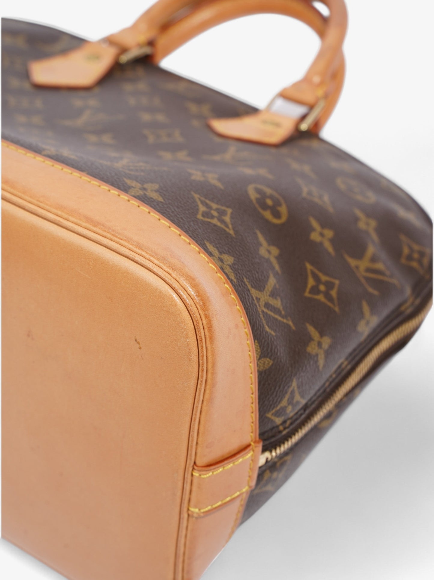 Louis Vuitton Alma Monogram Coated Canvas PM