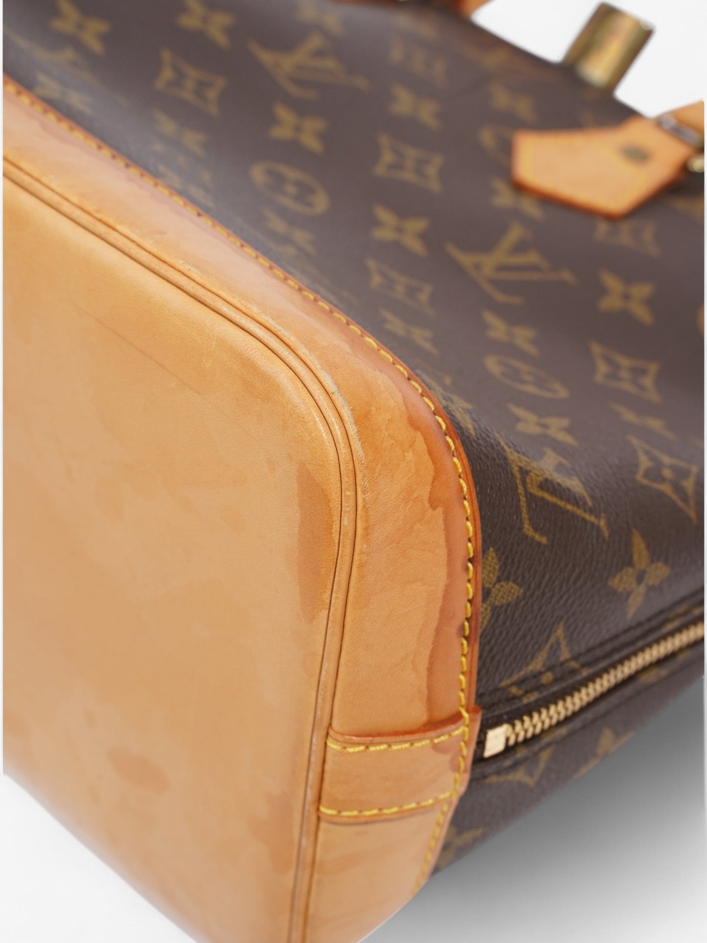 Louis Vuitton Alma Monogram Coated Canvas PM