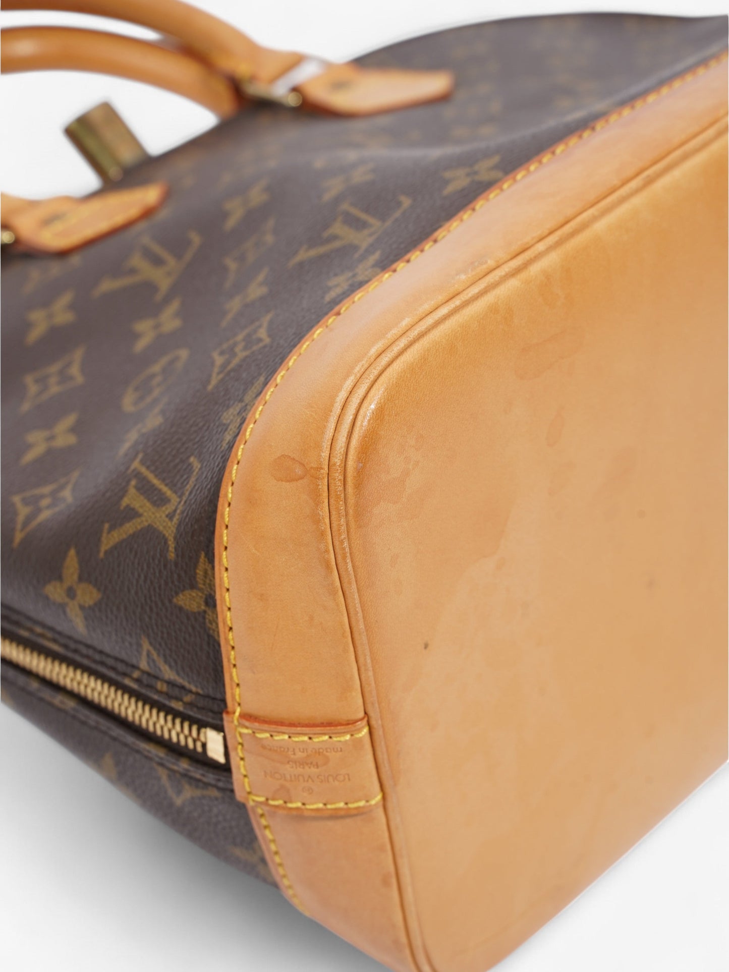 Louis Vuitton Alma Monogram Coated Canvas PM