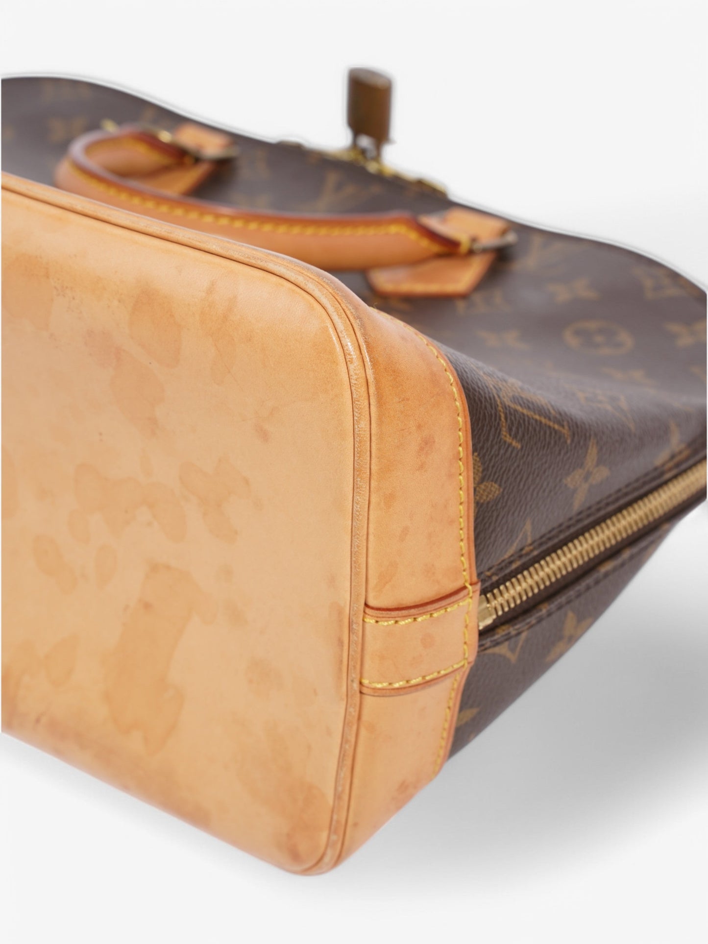Louis Vuitton Alma Monogram Coated Canvas PM