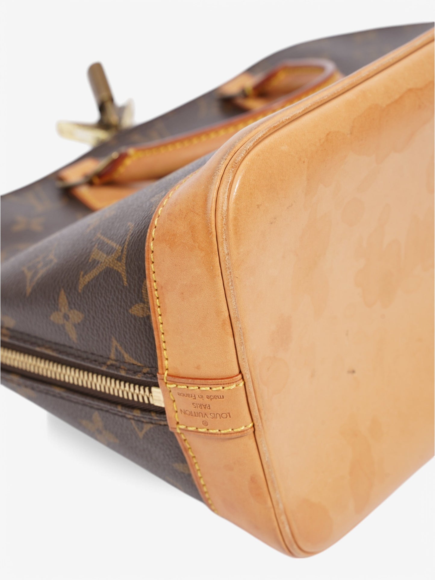 Louis Vuitton Alma Monogram Coated Canvas PM