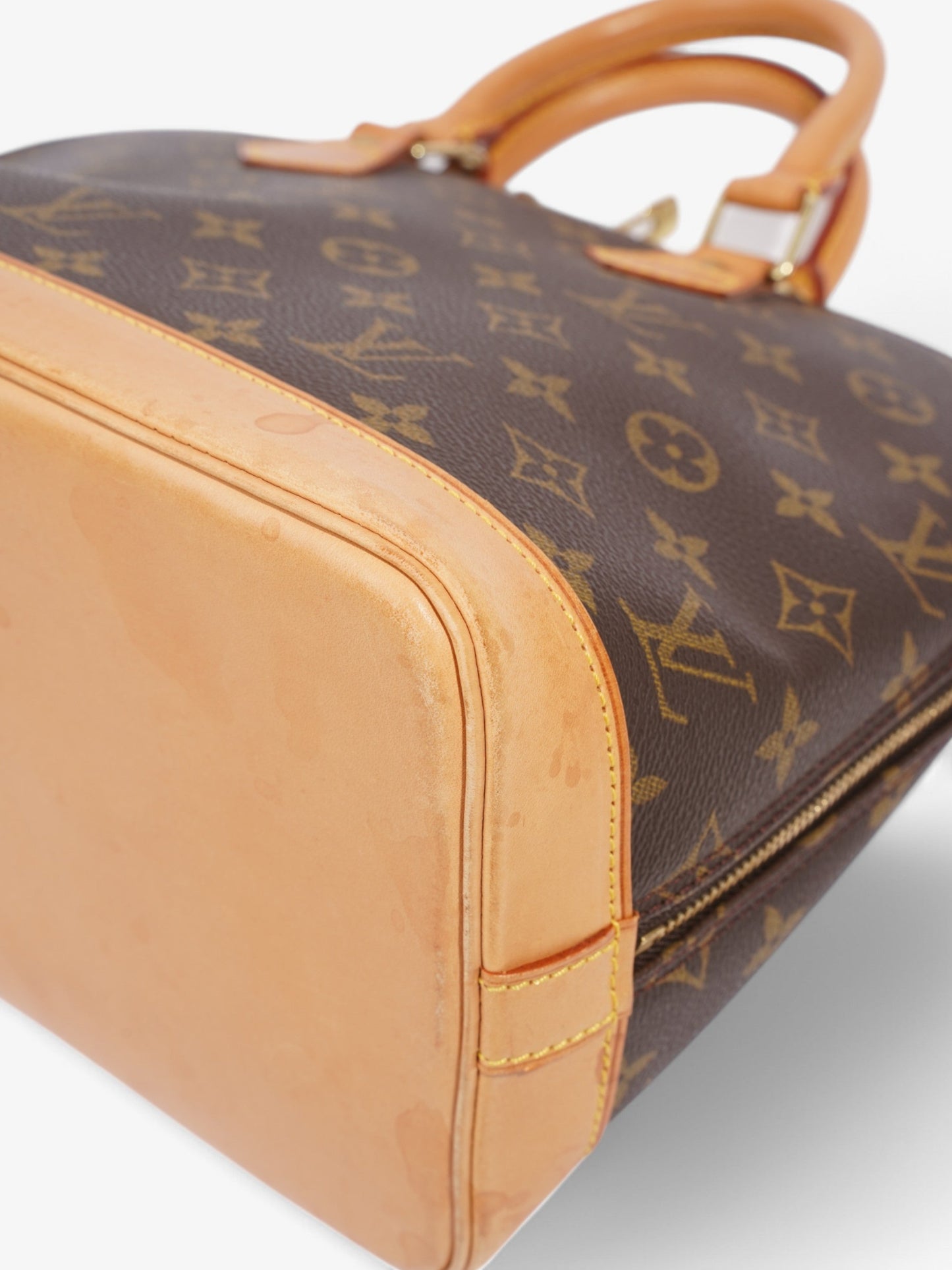 Louis Vuitton Alma Monogram Coated Canvas PM