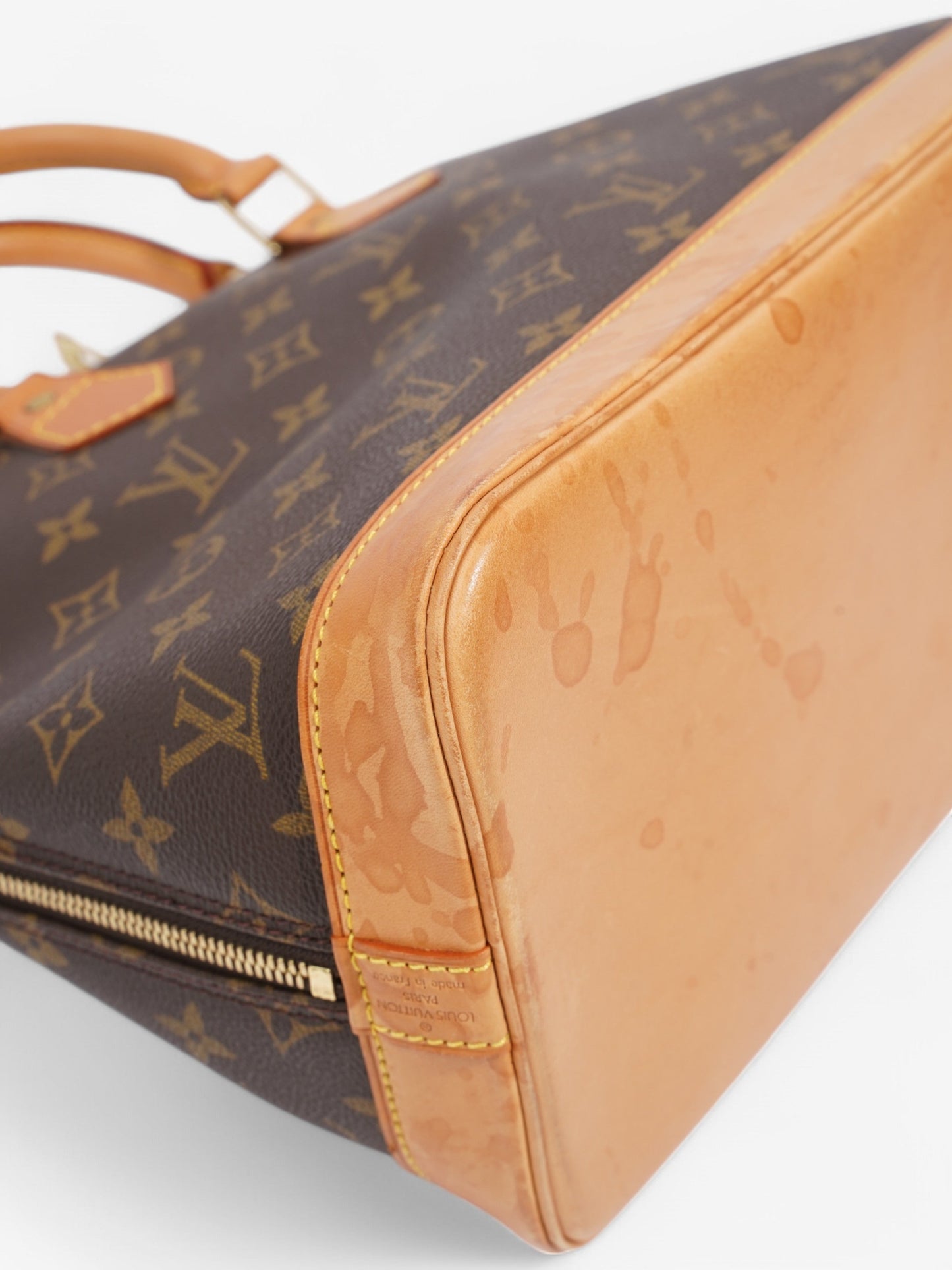Louis Vuitton Alma Monogram Coated Canvas PM