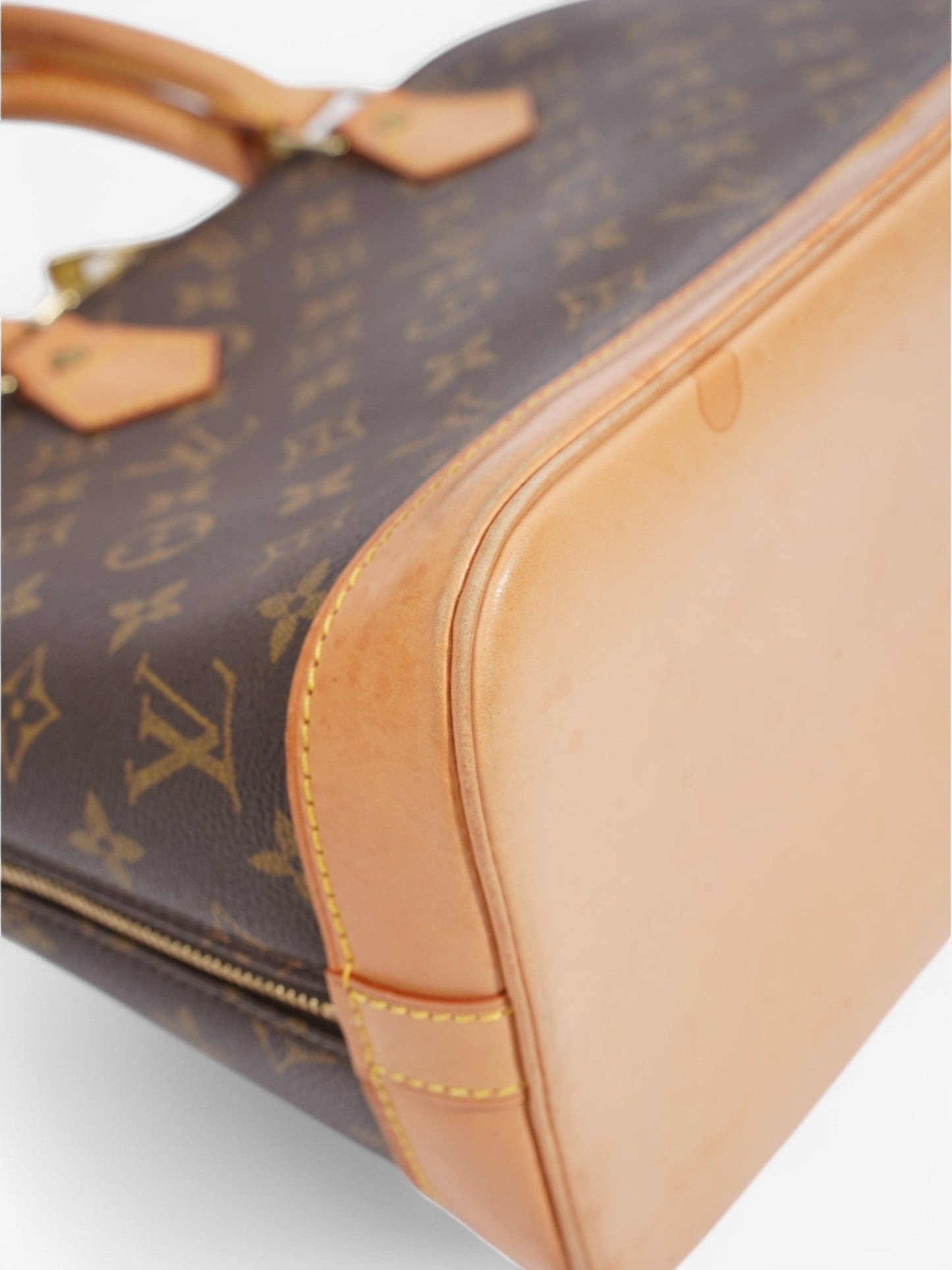 Louis Vuitton Alma Monogram Coated Canvas PM