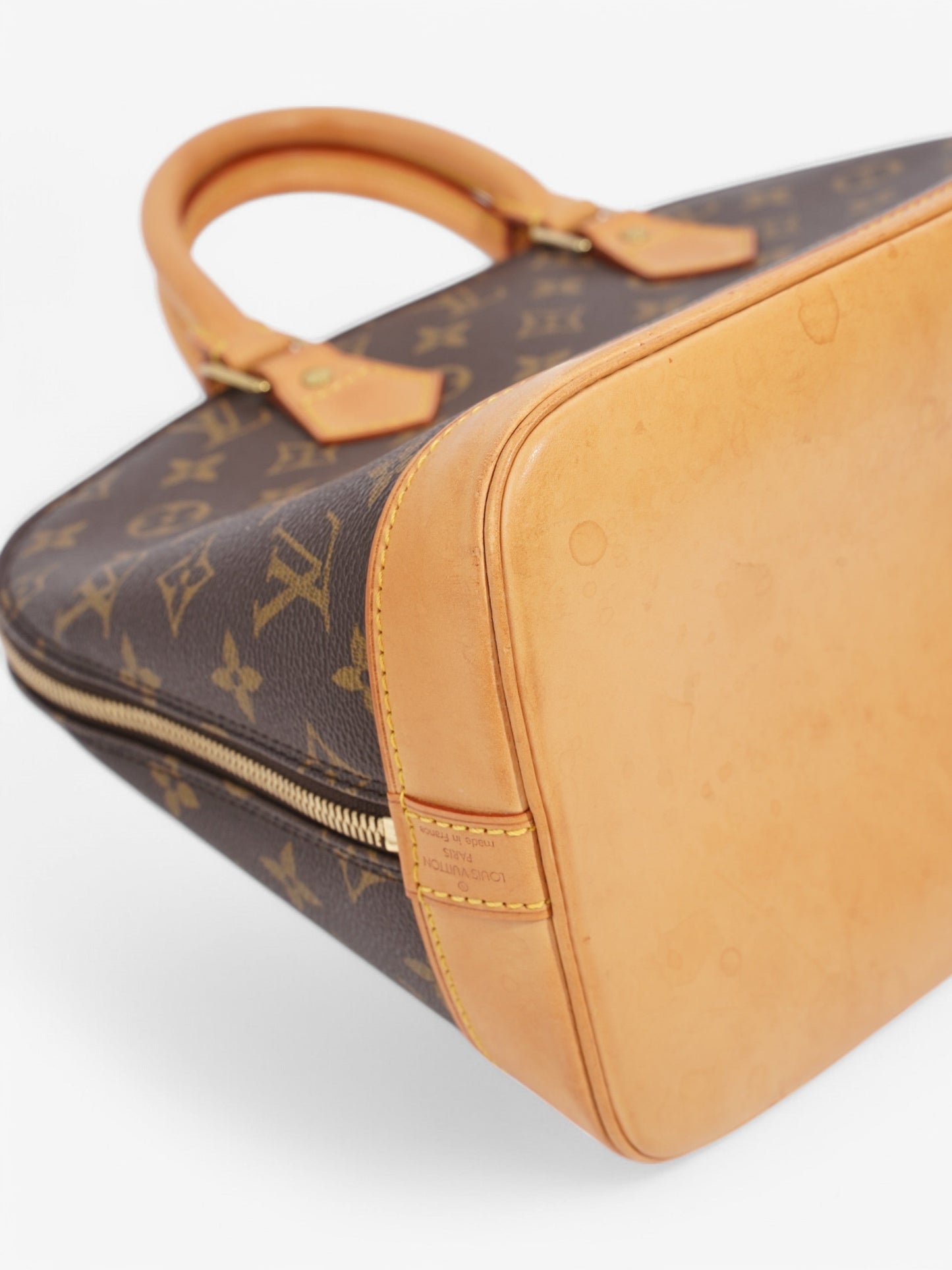 Louis Vuitton Alma Monogram Coated Canvas PM