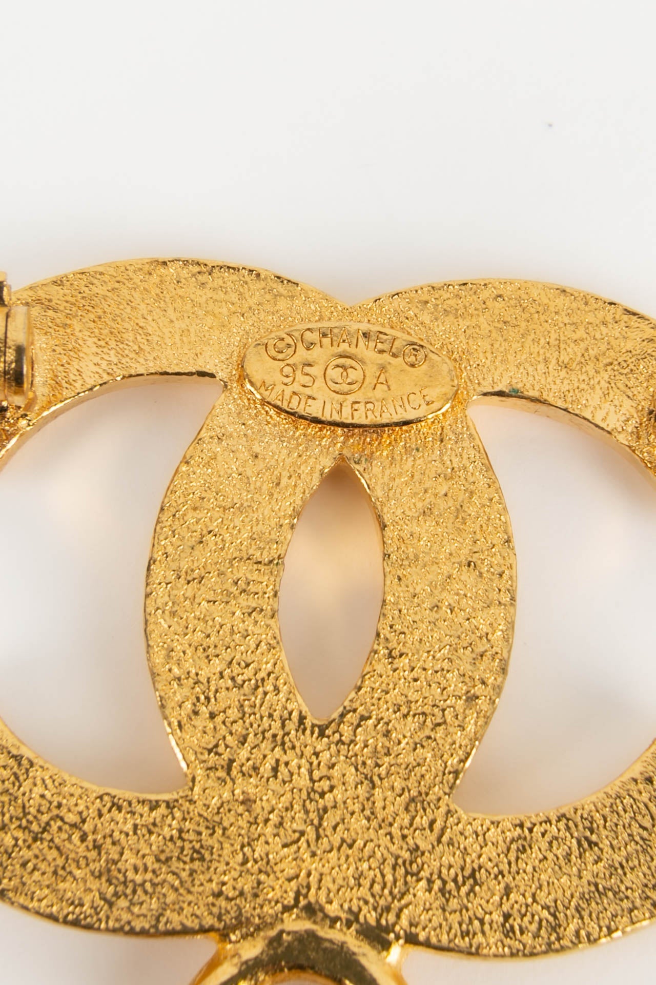 Broche charms Chanel 1995