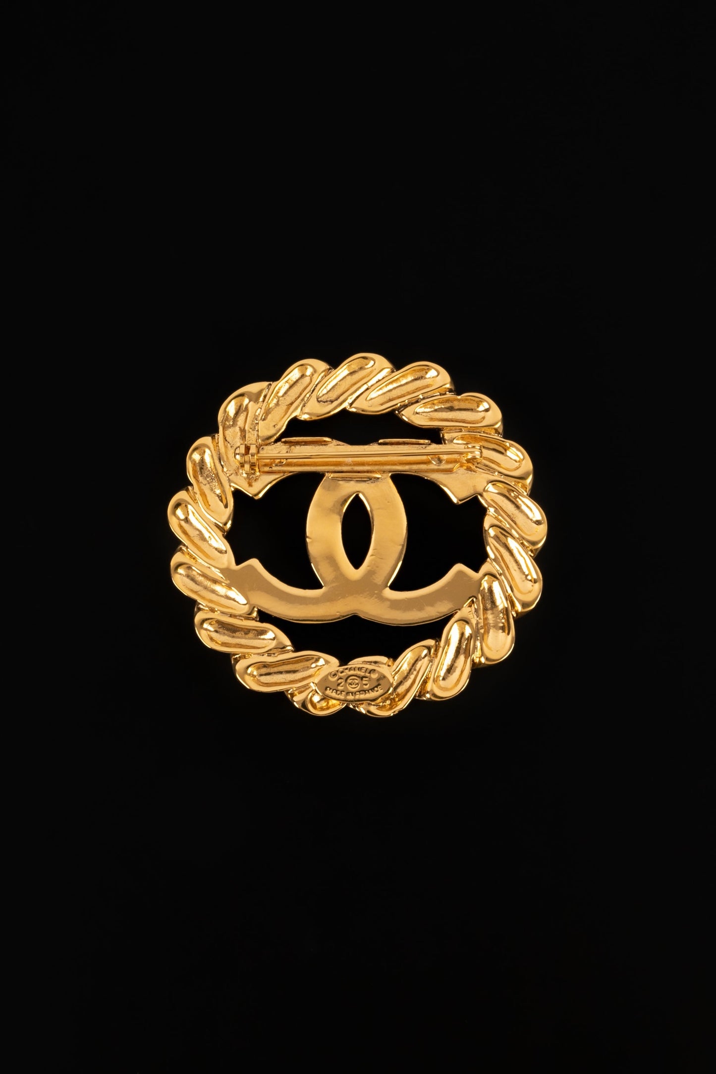 Broche en mÃ©tal dorÃ©