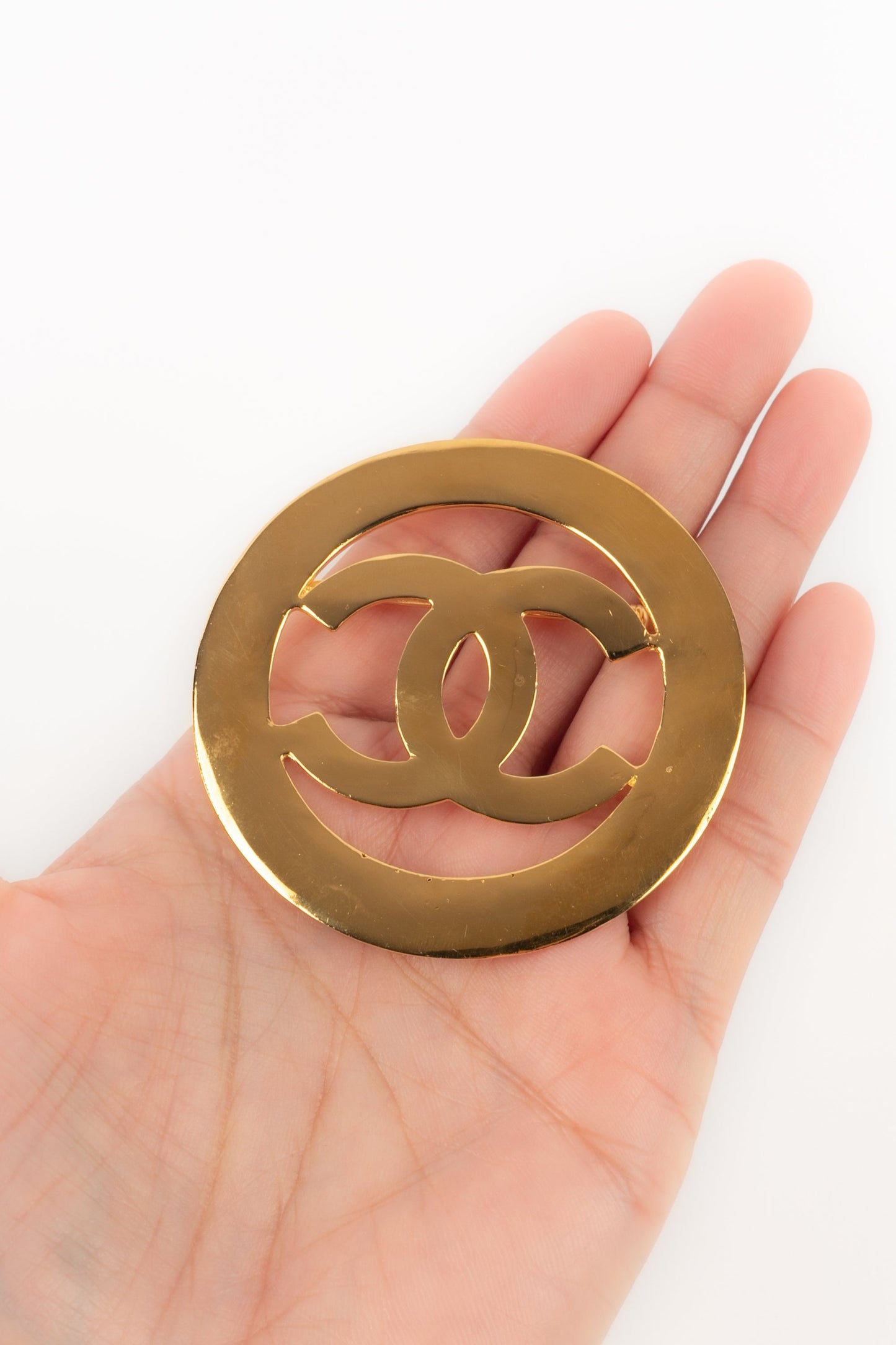 Broche dorÃ©e Chanel 1990's
