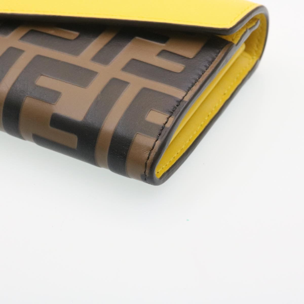 FENDI Zucca F is Continental Wallet Embossed Leather Yellow Brown 34531