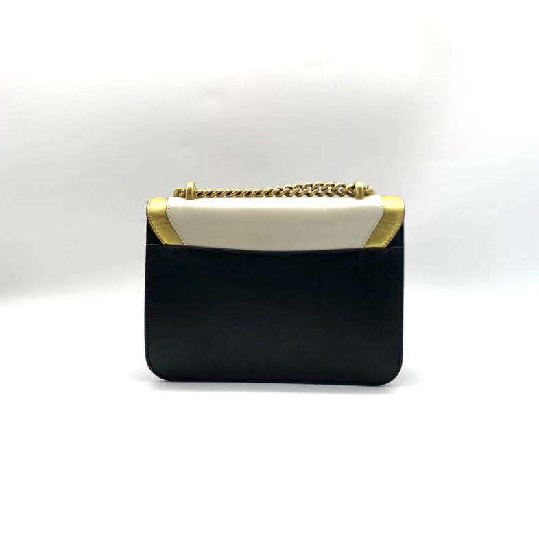 Gucci Small Black and White Leather Chain Bag with Gold Accents