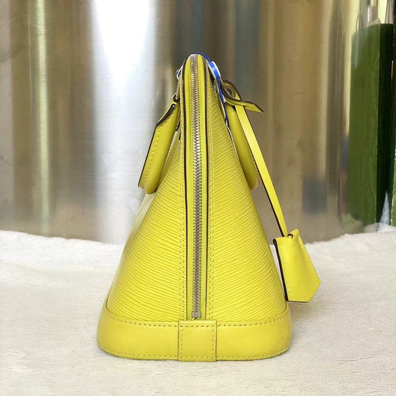 Louis Vuitton Alma Yellow Leather Bag Medium Size