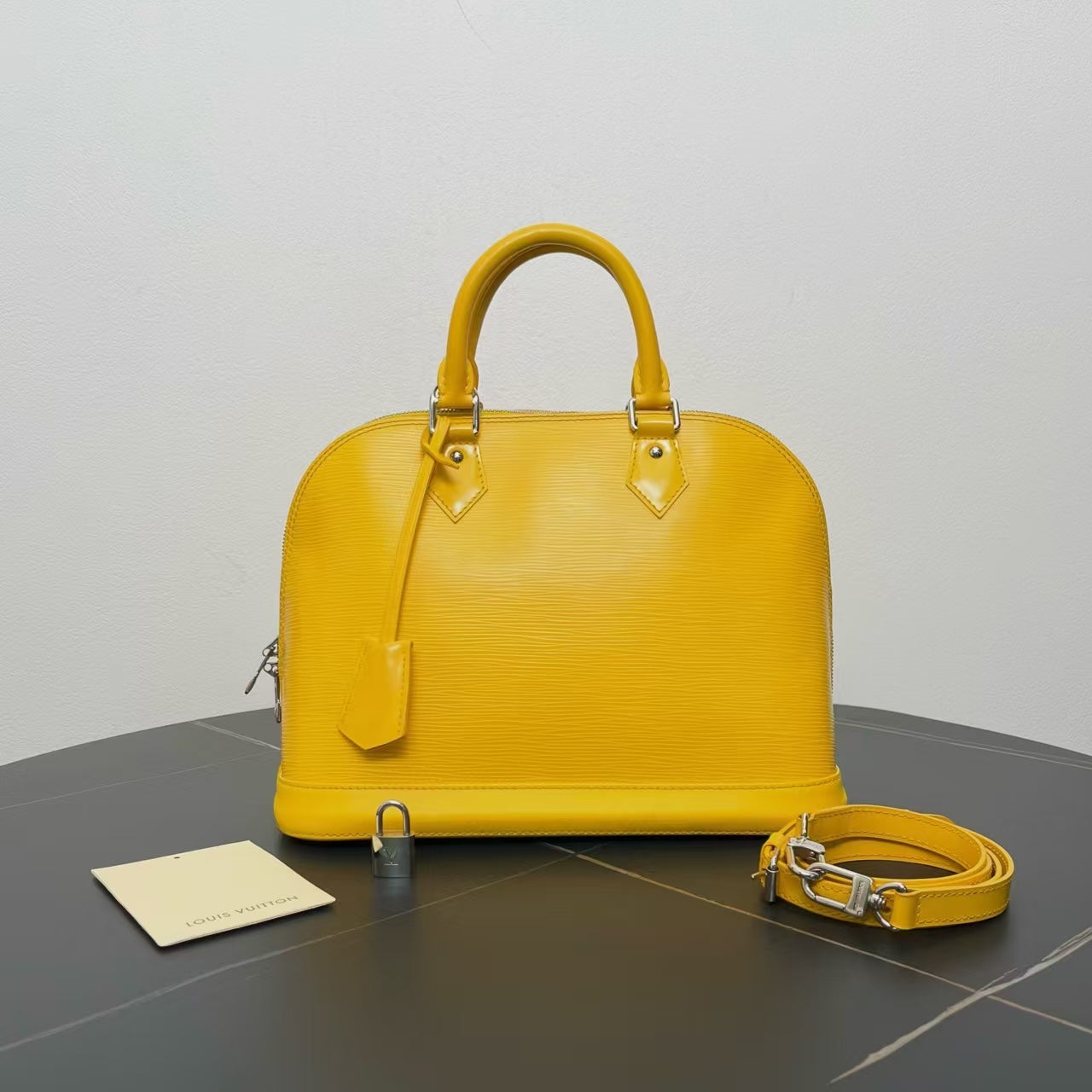 Louis Vuitton Alma PM Yellow Epi Leather Handbag