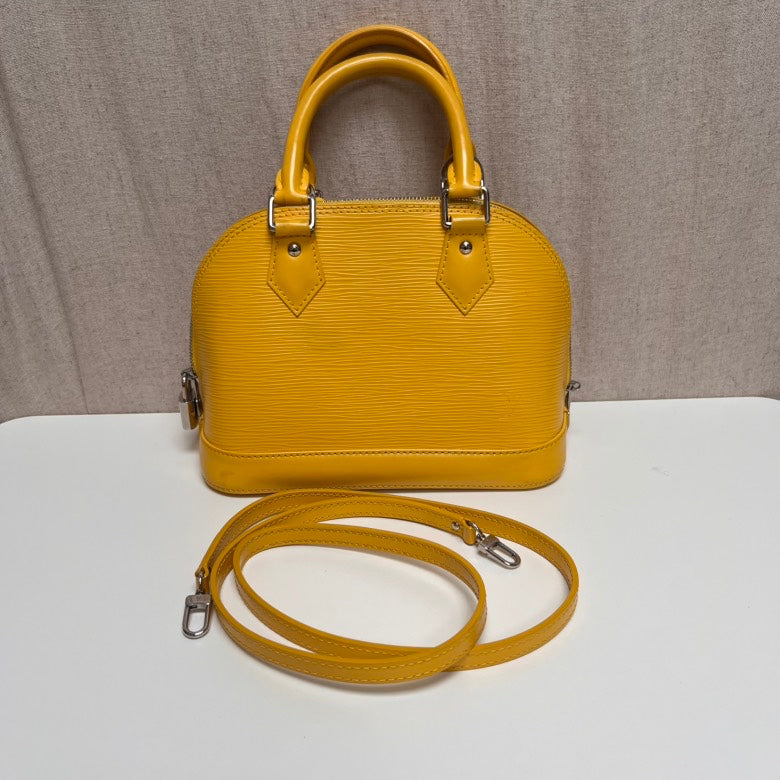 Louis Vuitton Alma Yellow Leather Handbag Small