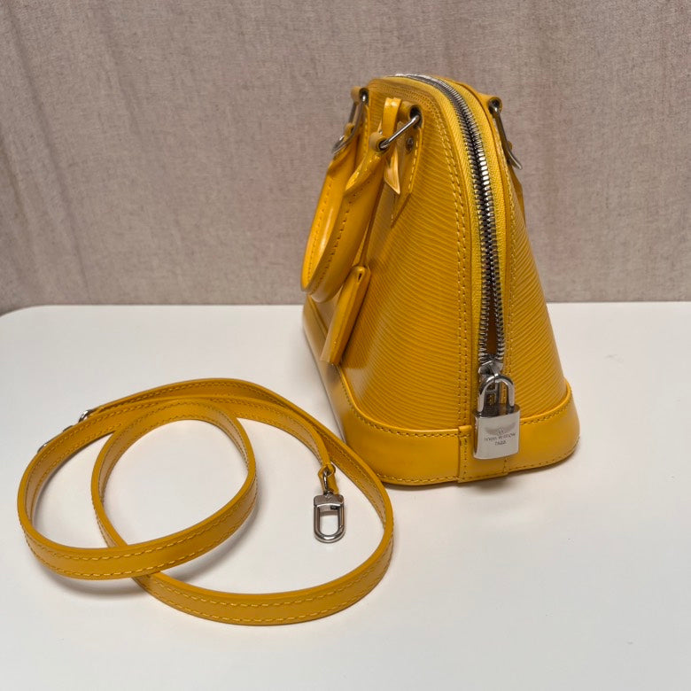 Louis Vuitton Alma Yellow Leather Handbag Small