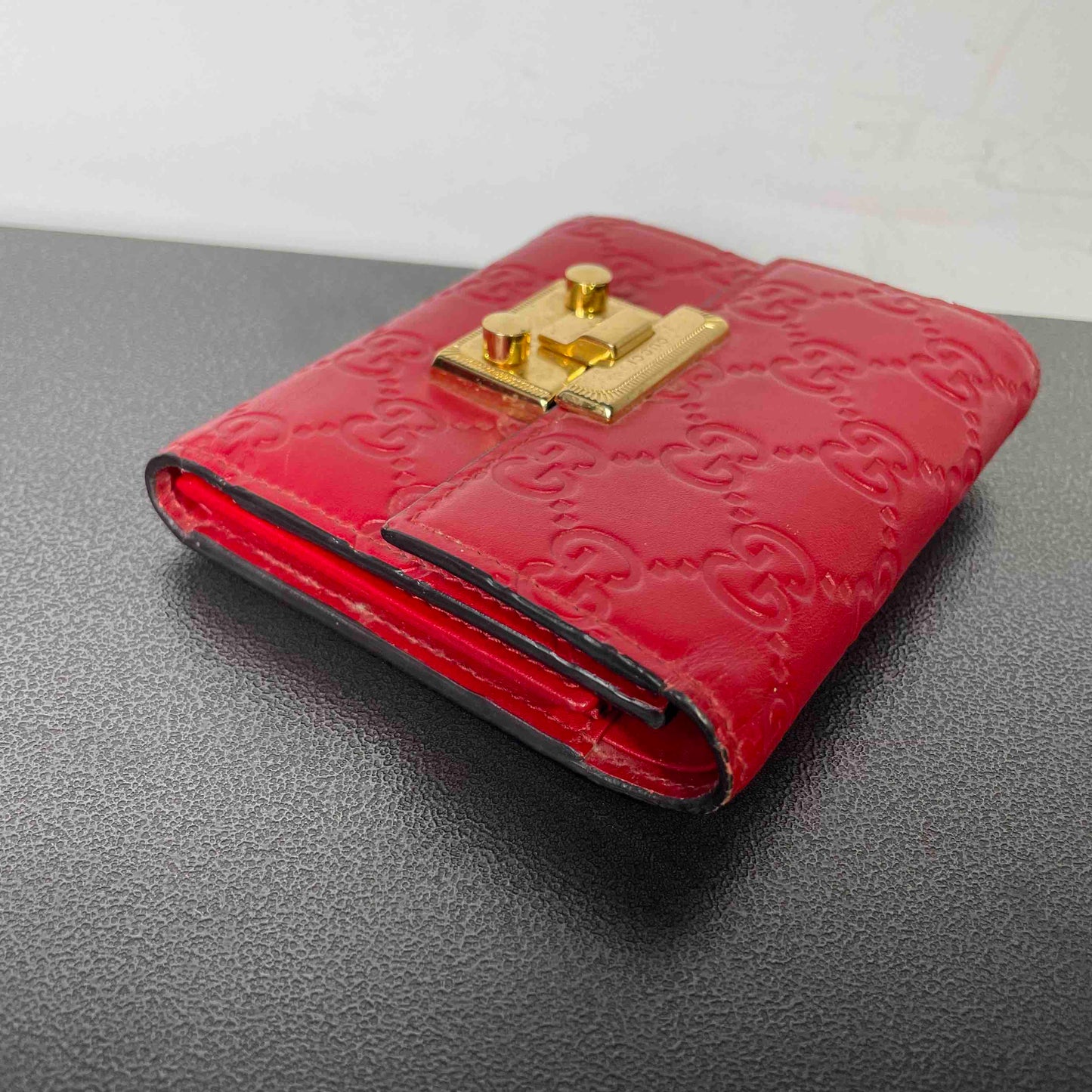 Gucci Embossed Red Wallet