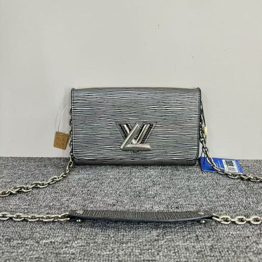 Louis Vuitton Twist WOC Silver Clutch