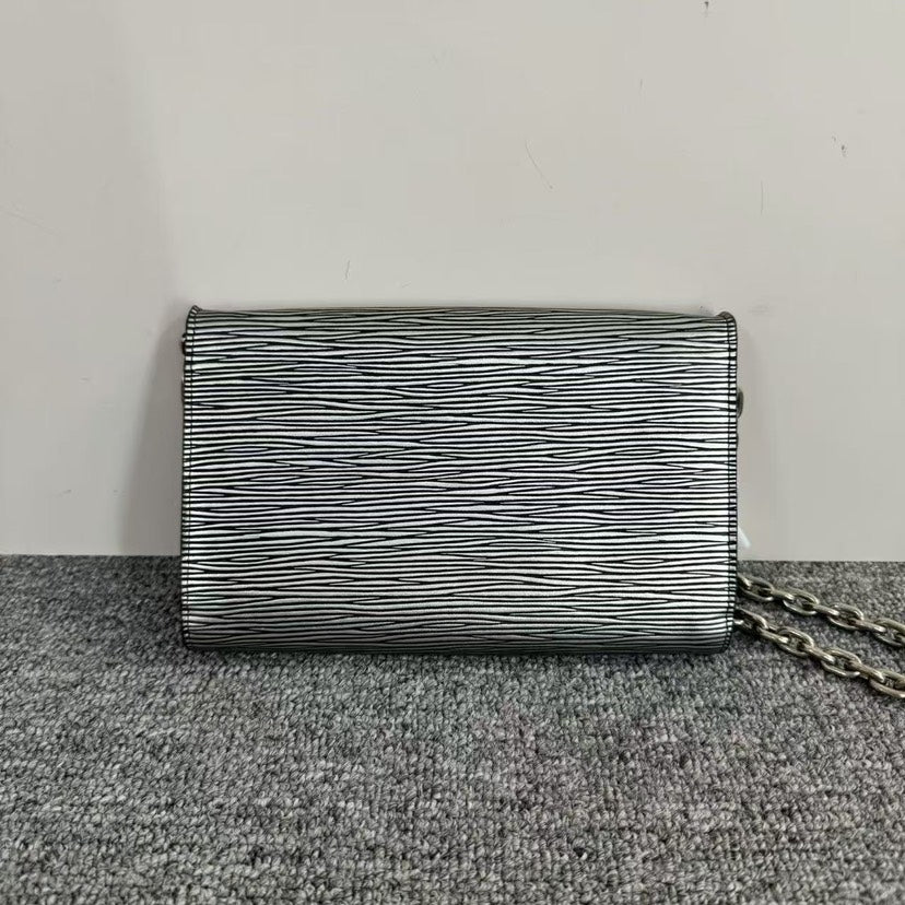 Louis Vuitton Twist WOC Silver Clutch