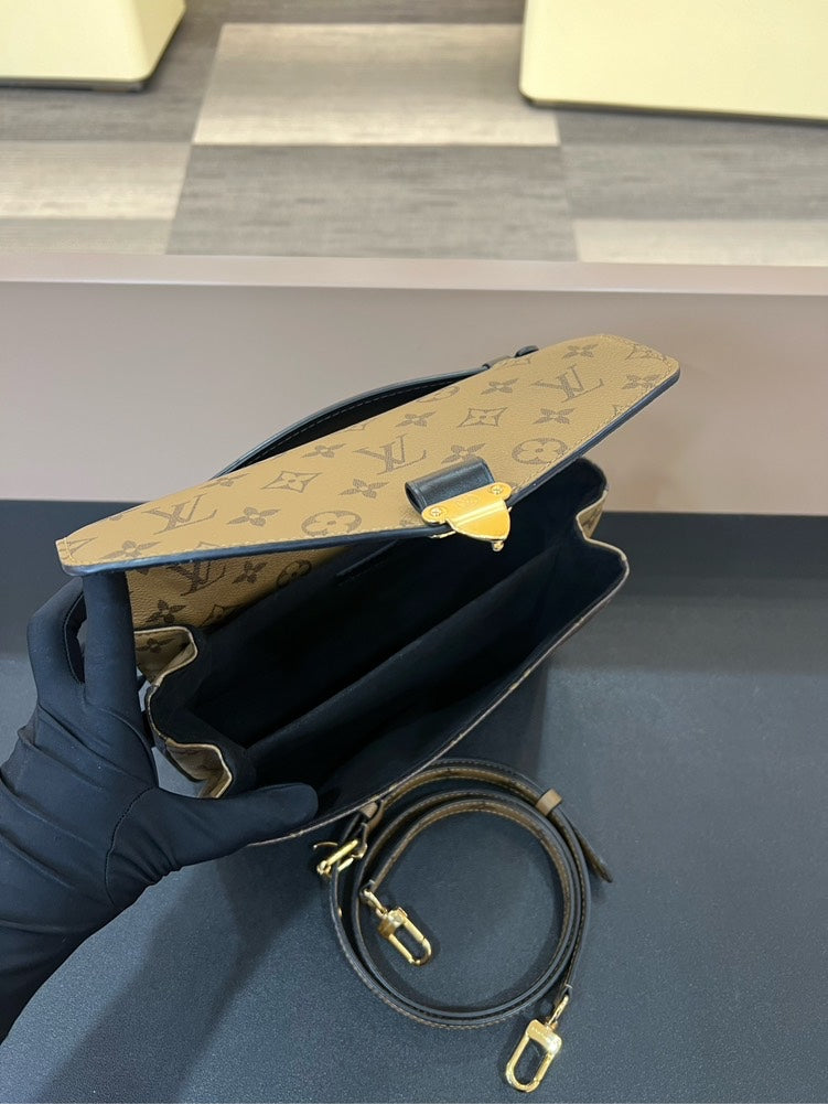 Louis Vuitton Pochette Metis Monogram Handbag